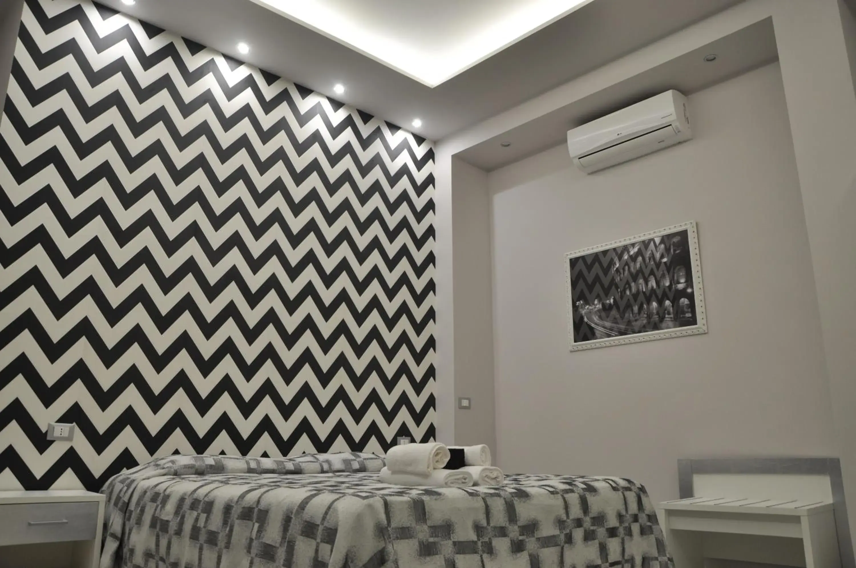 Decorative detail, Bed in Il Corso Suite Decorative detail, Bed in Il Corso Suite