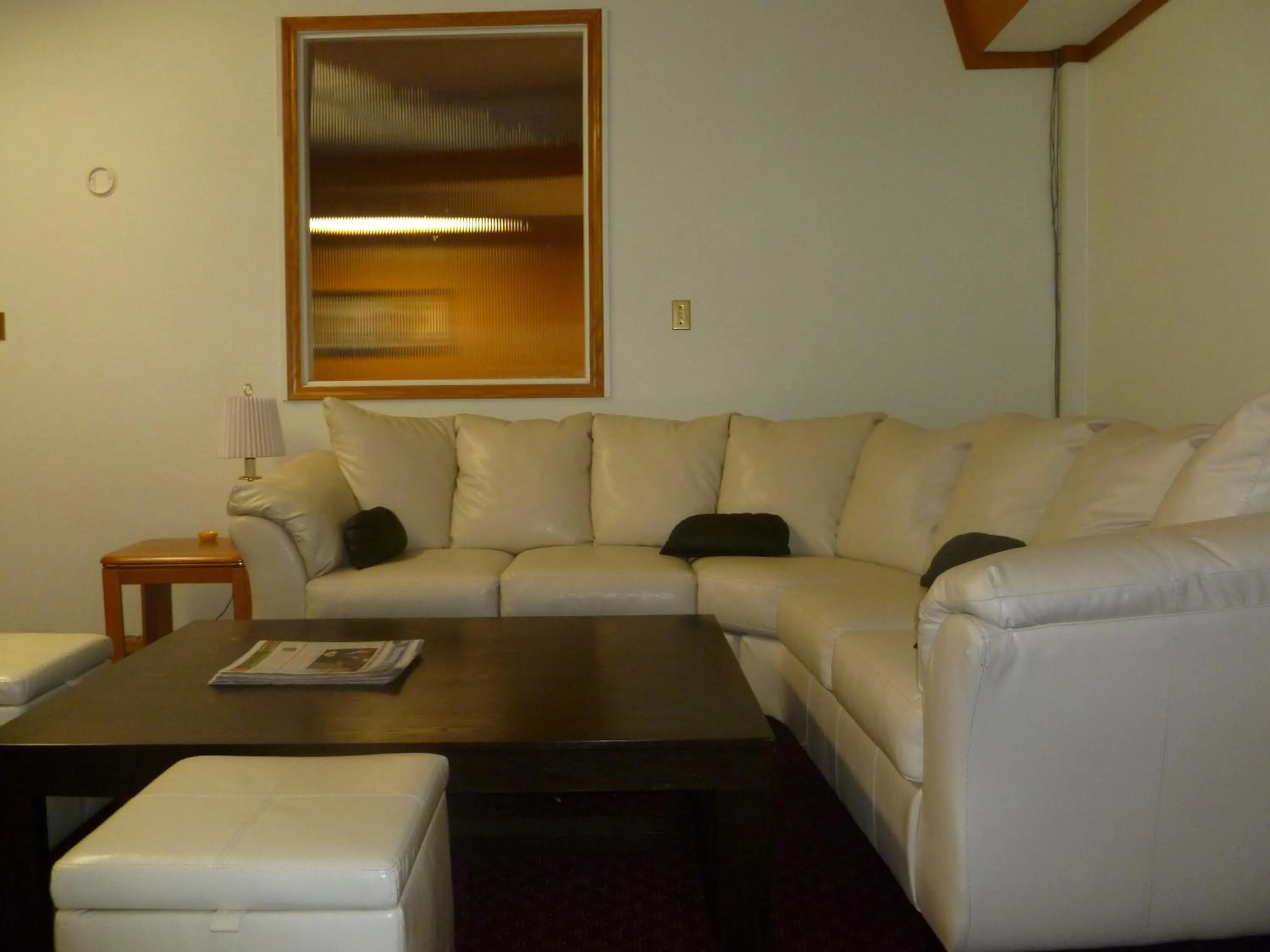 Communal lounge/ TV room in Vernon Hostel