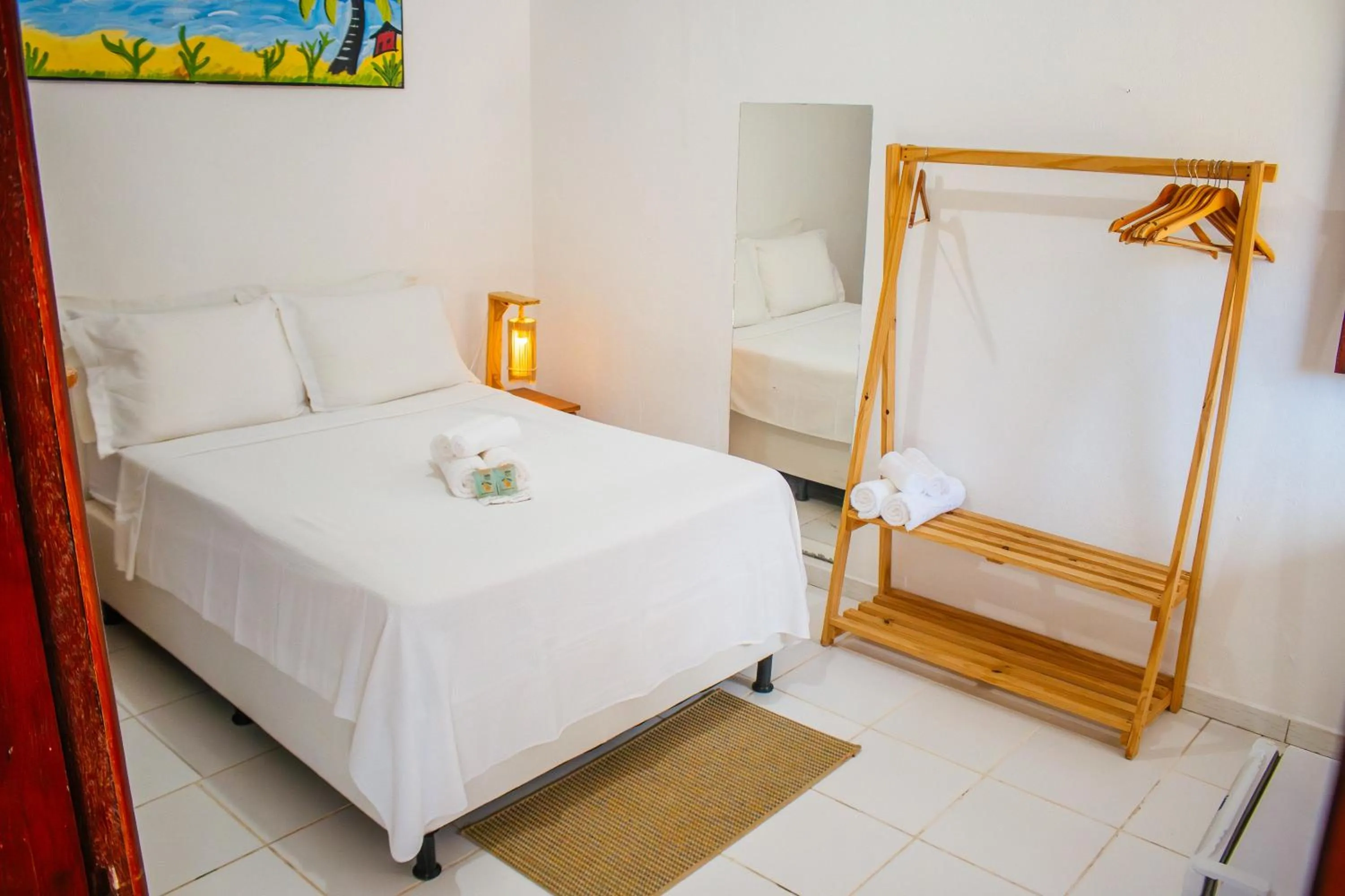 Bed in Pousada do Enildo