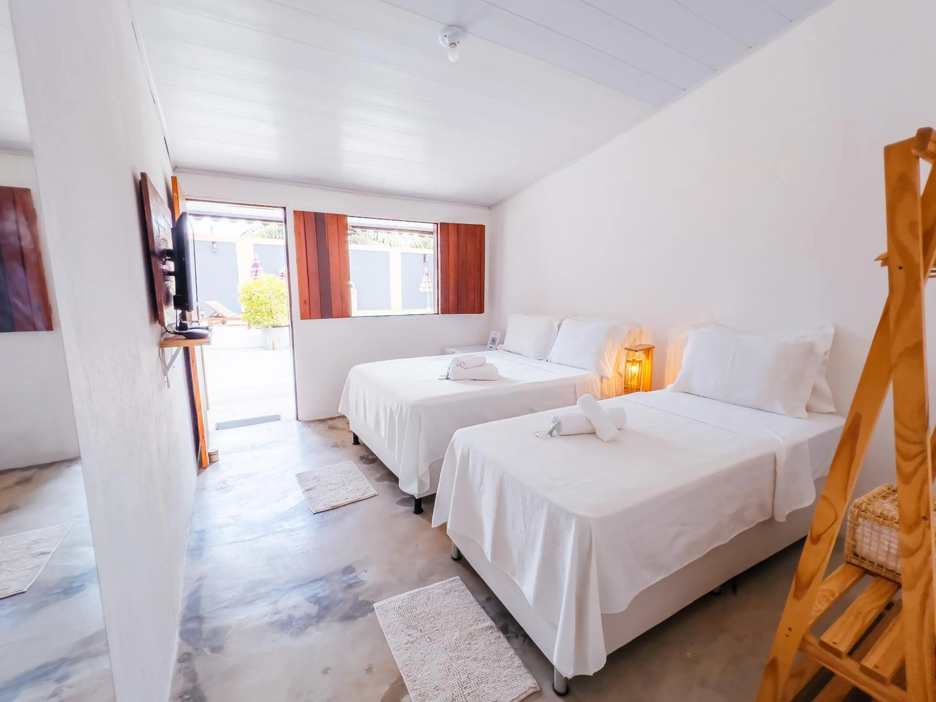 Bed in Pousada do Enildo