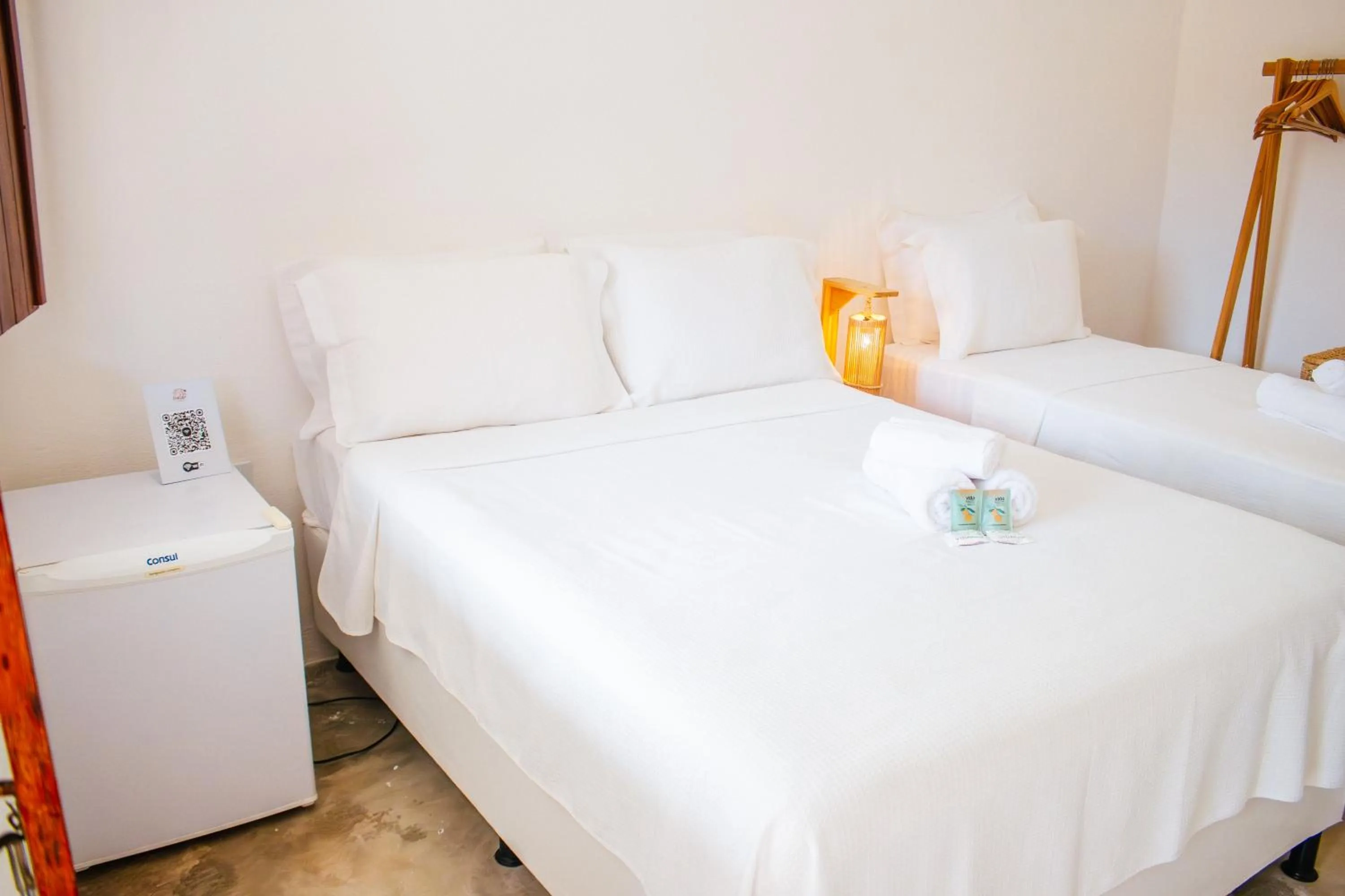 Bed in Pousada do Enildo