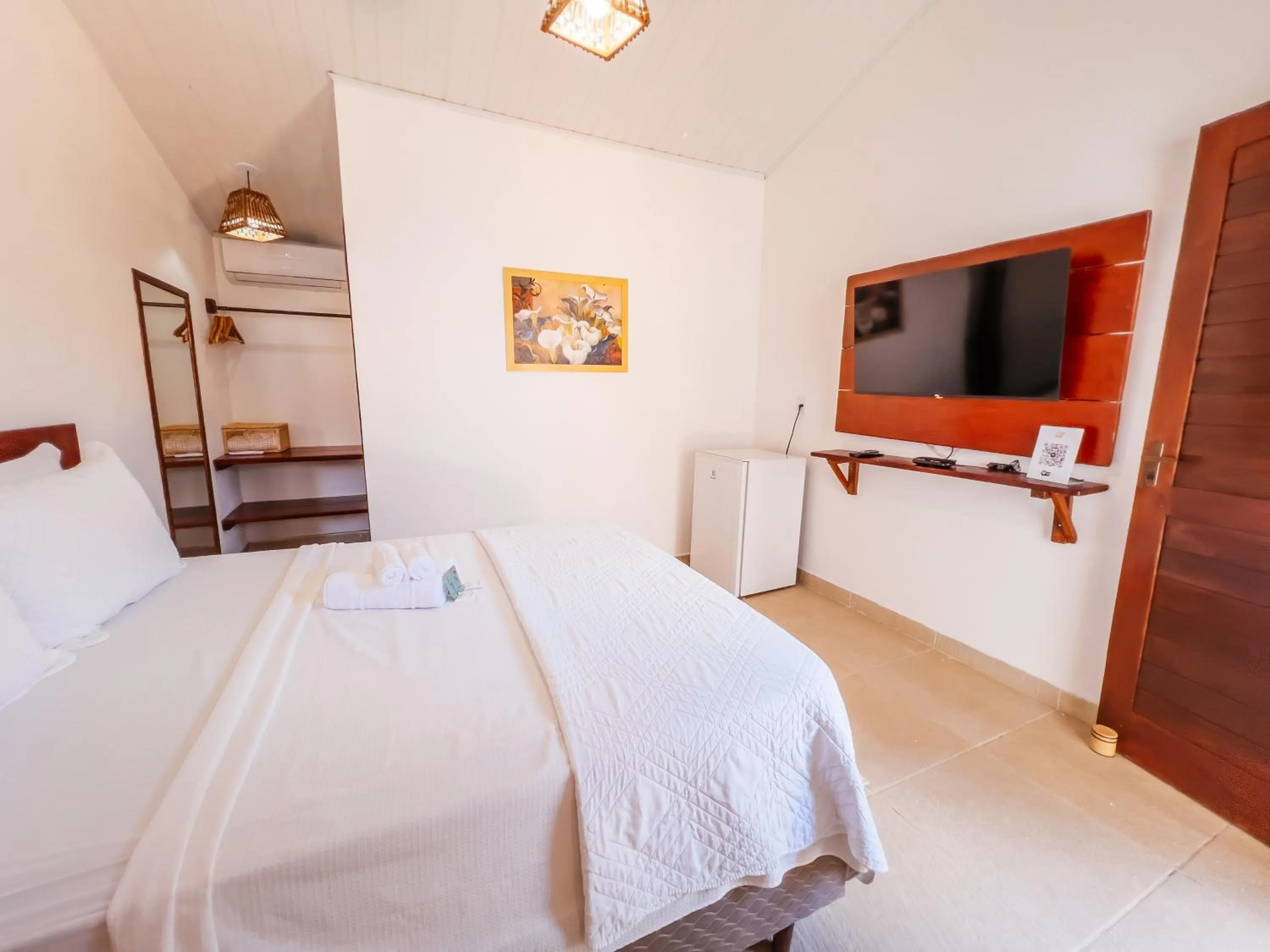 Bed in Pousada do Enildo