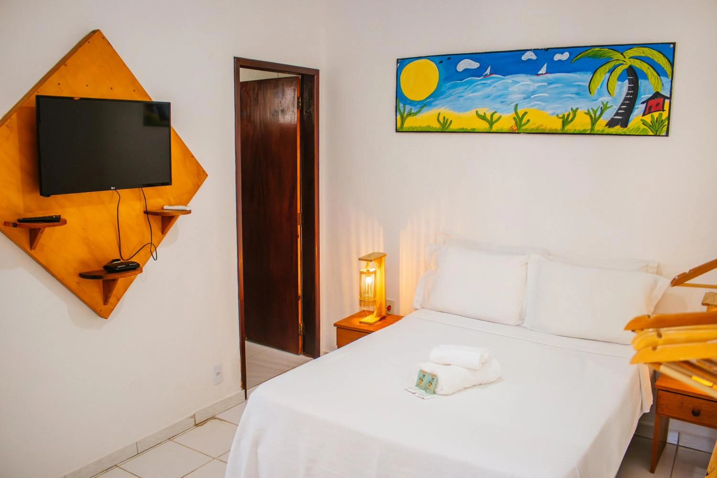 Bed in Pousada do Enildo