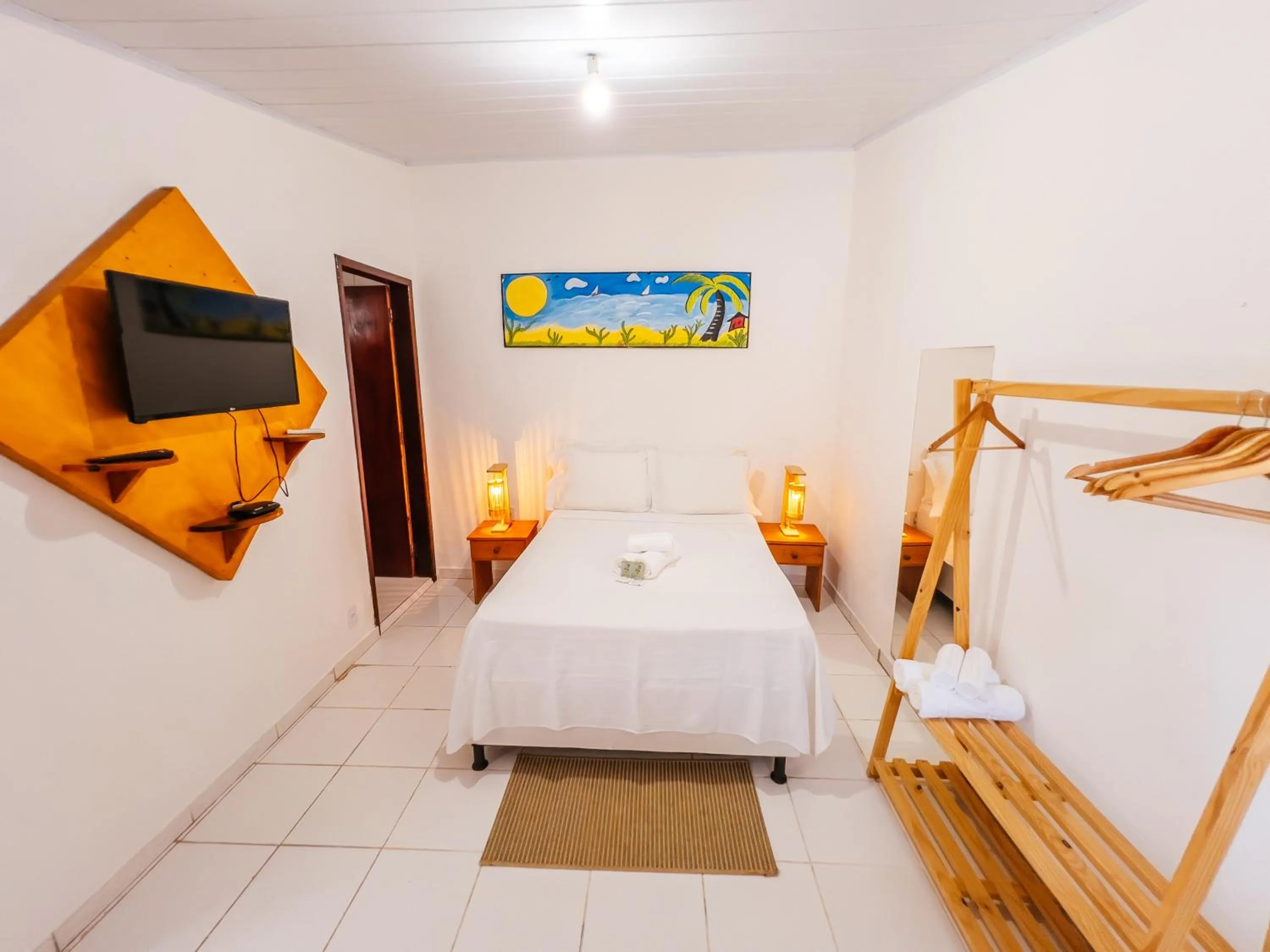 Bed in Pousada do Enildo