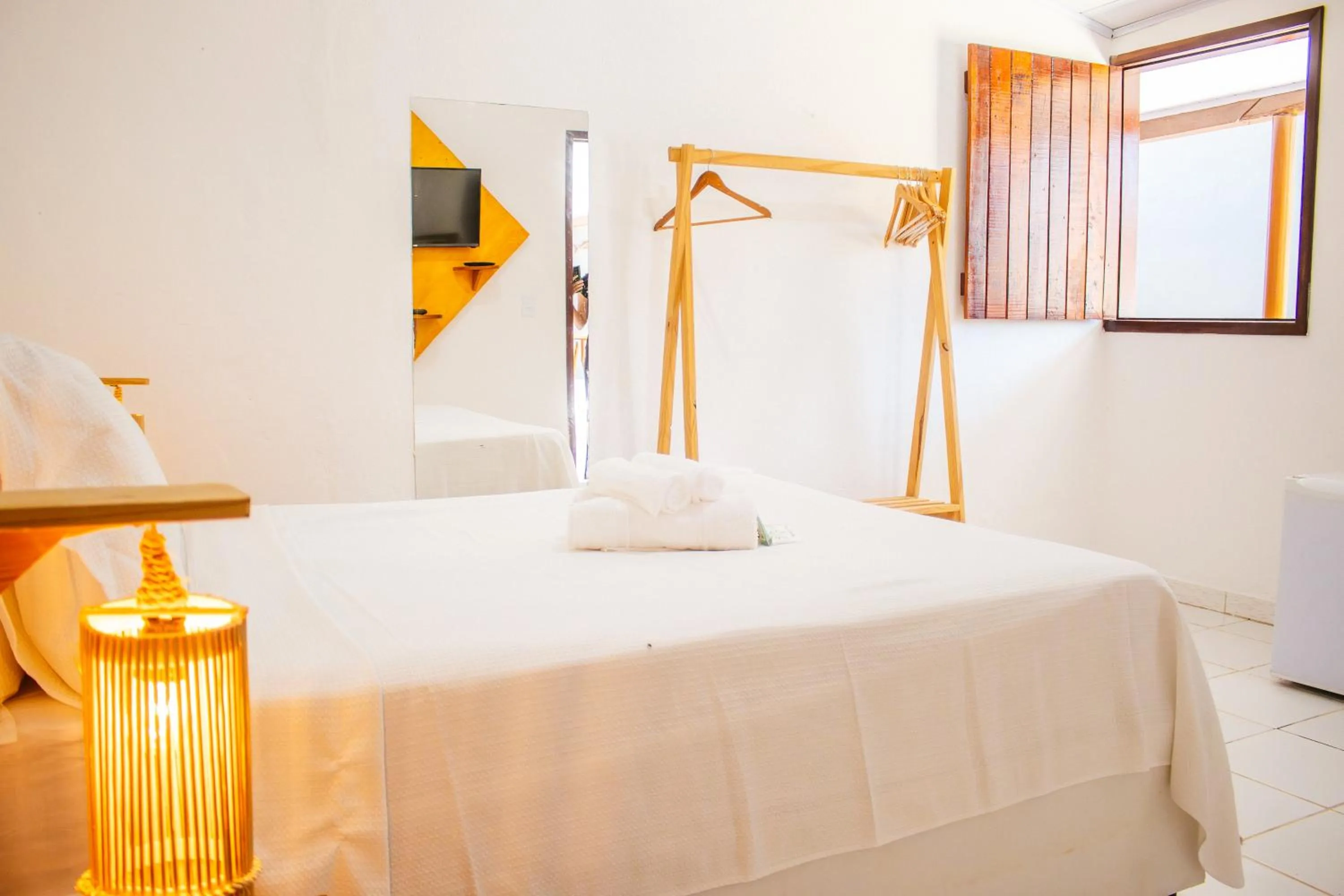 Bed in Pousada do Enildo