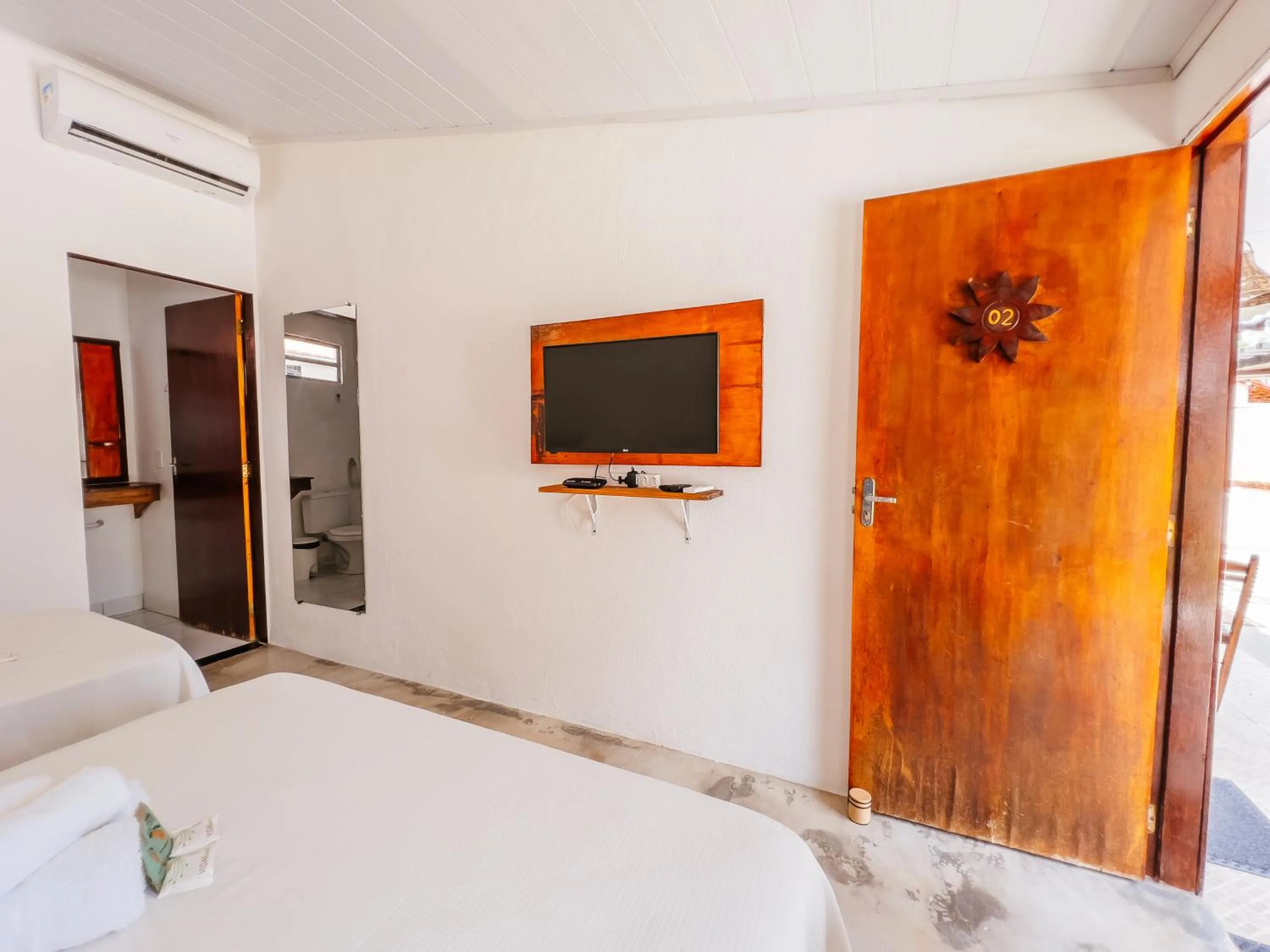 Bed in Pousada do Enildo