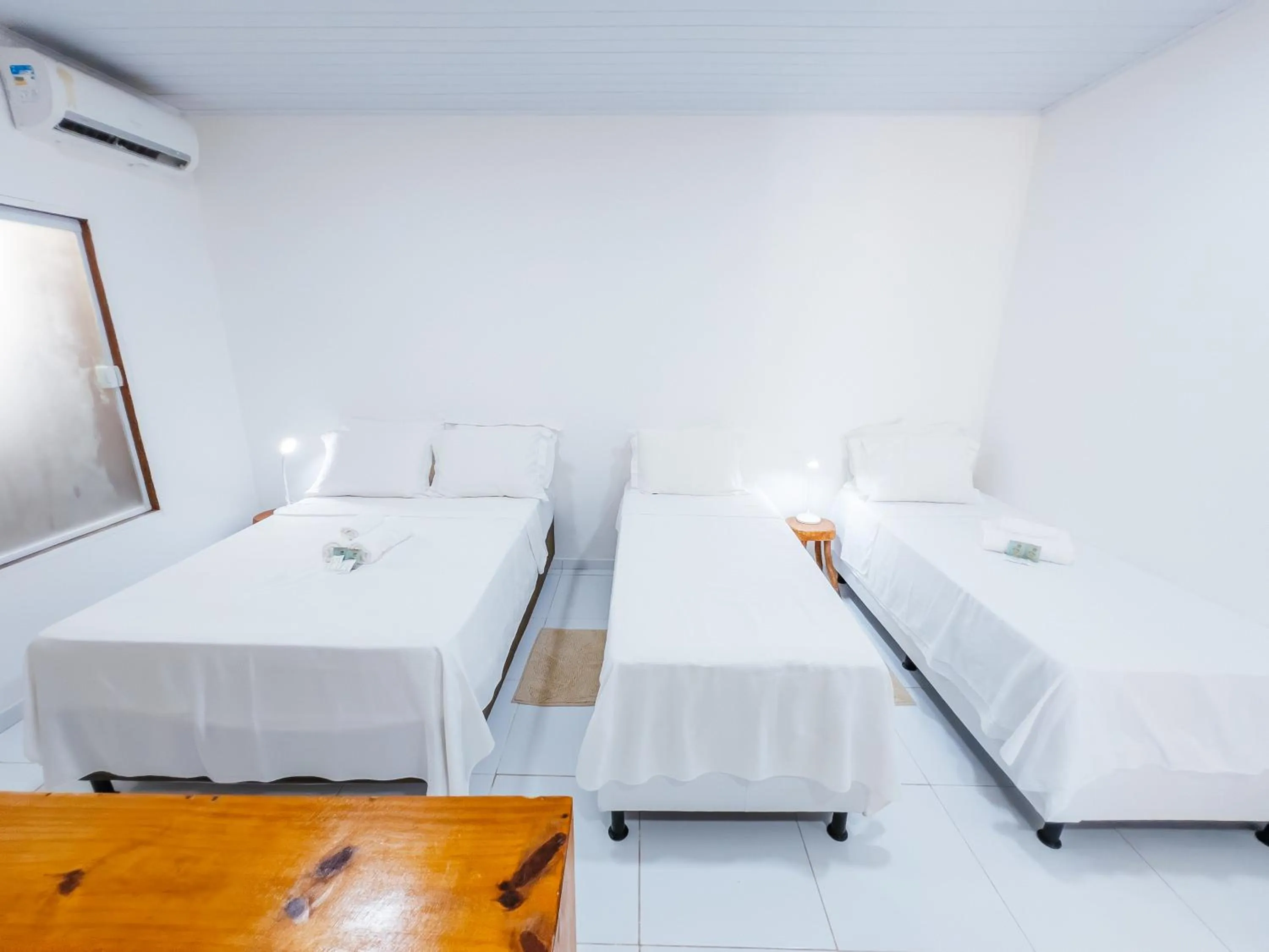 Bed in Pousada do Enildo