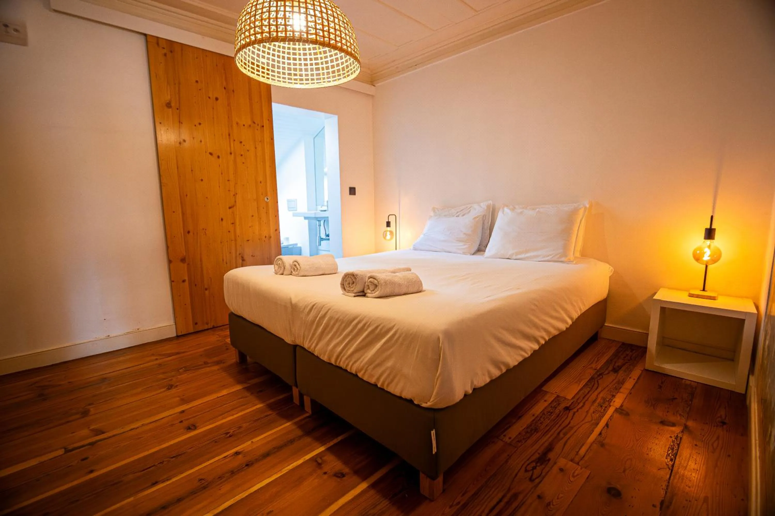 Bed in VAGO Alcântara Suites