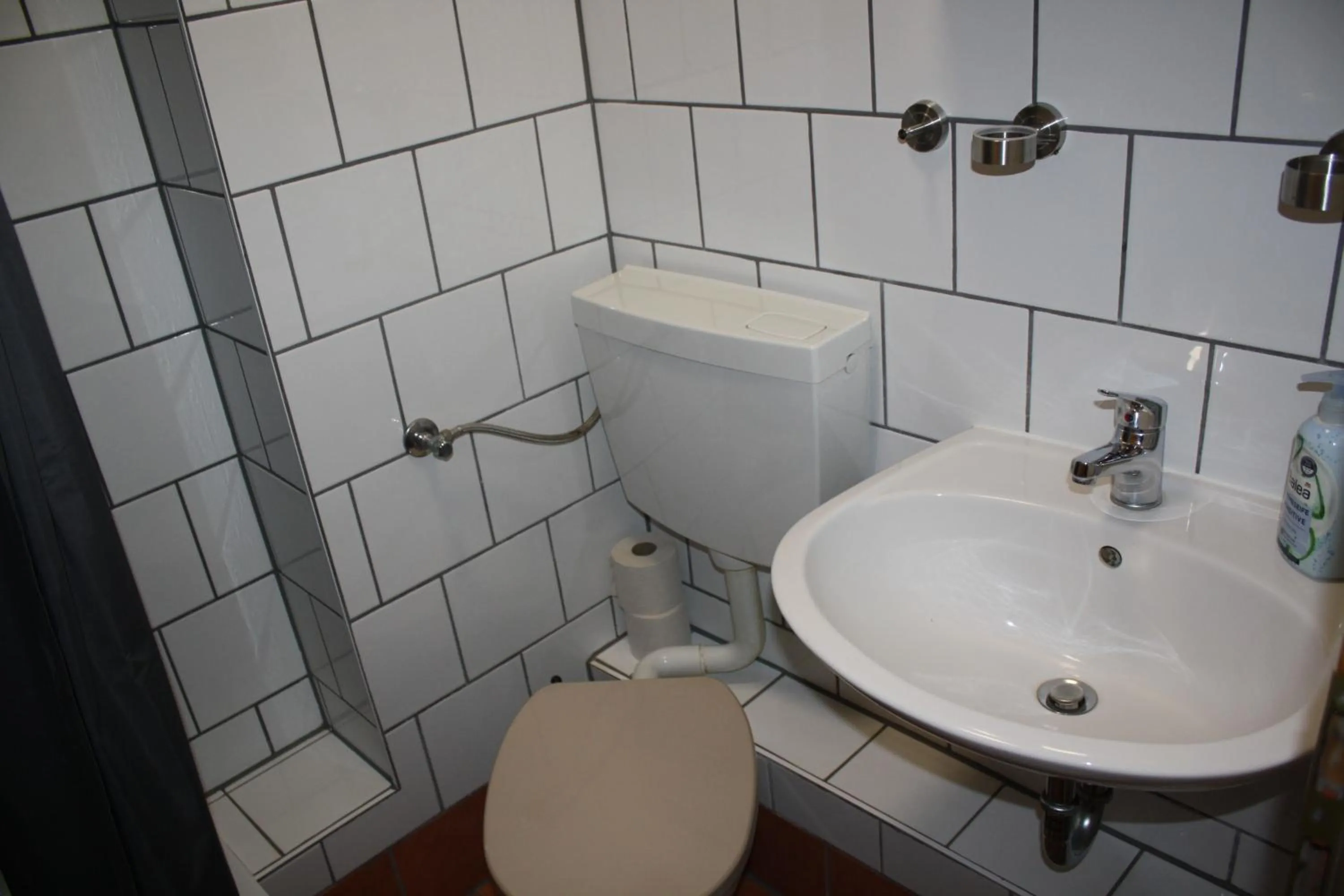 Bathroom in Pensionszimmer Unicat