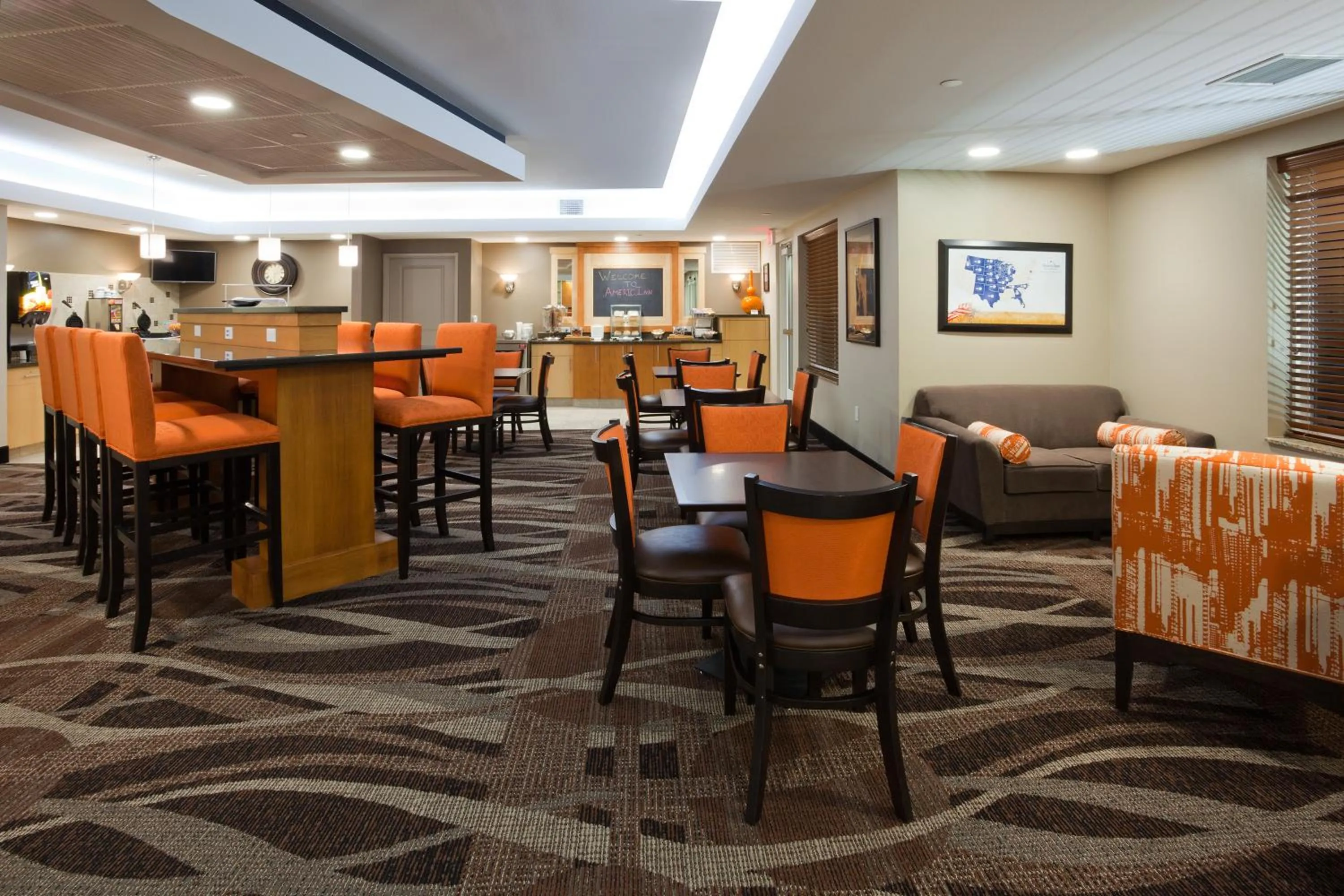 Lobby or reception in AmericInn by Wyndham Waupun