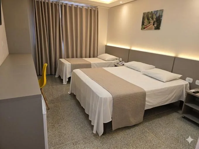 Bed in Itumbiara Palace Hotel