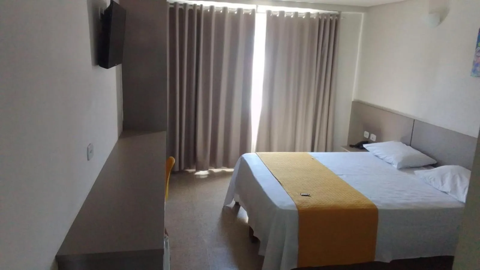 Bed in Itumbiara Palace Hotel