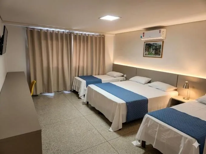 Bed in Itumbiara Palace Hotel