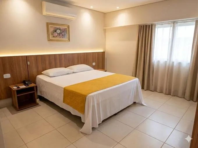 Bed in Itumbiara Palace Hotel