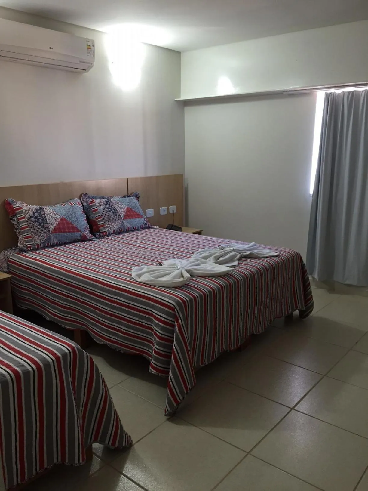 Bed in Itumbiara Palace Hotel