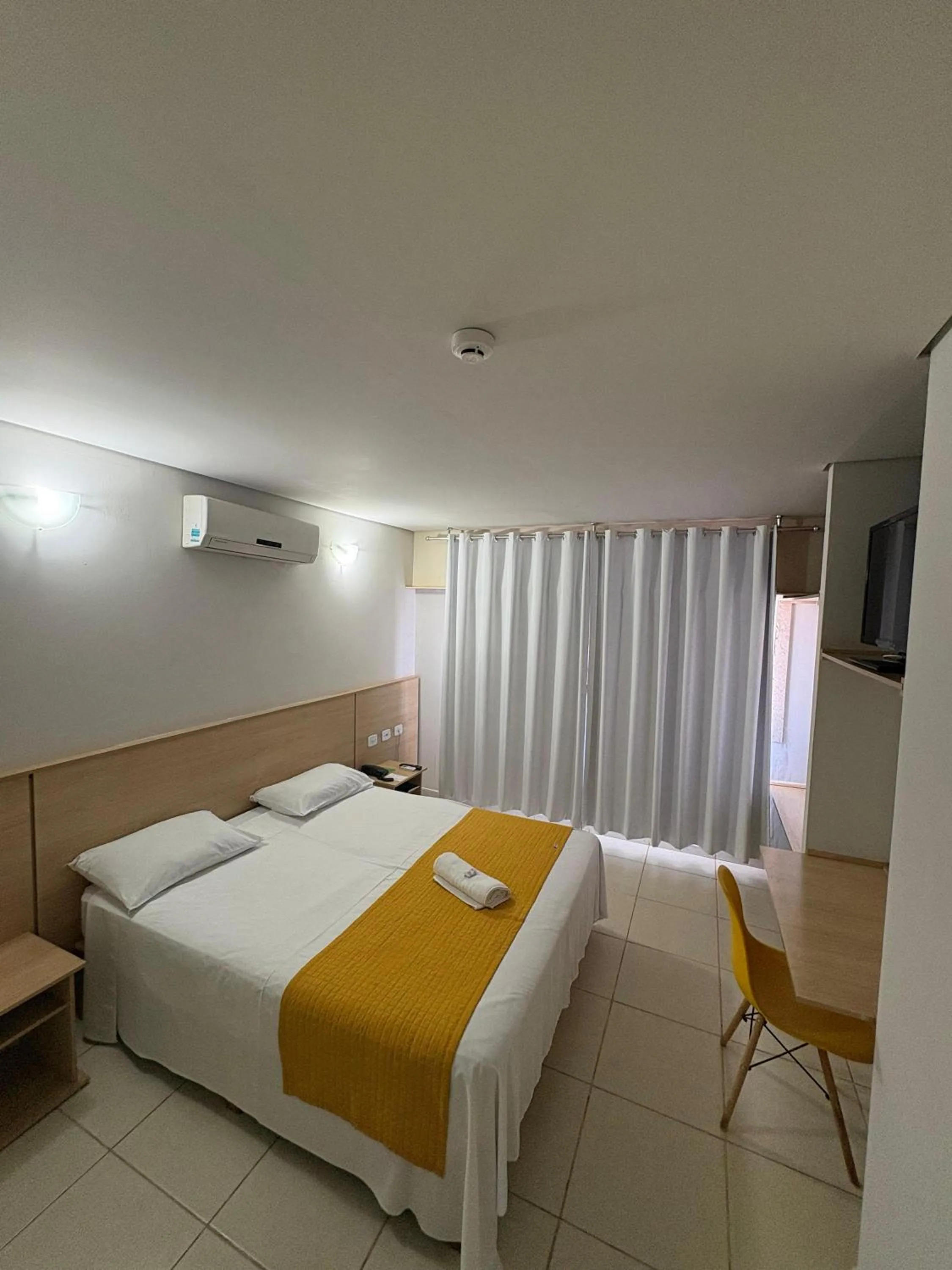 Bed in Itumbiara Palace Hotel
