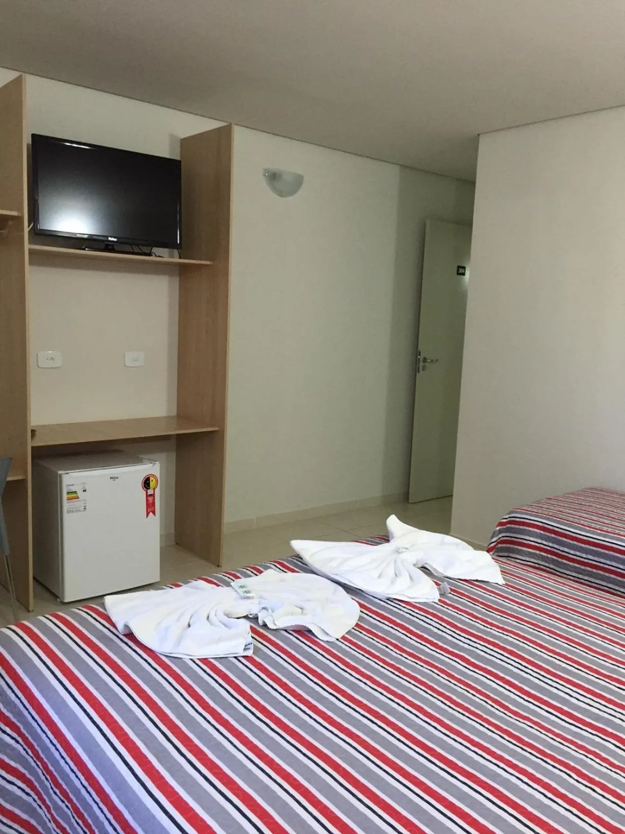 Bed in Itumbiara Palace Hotel