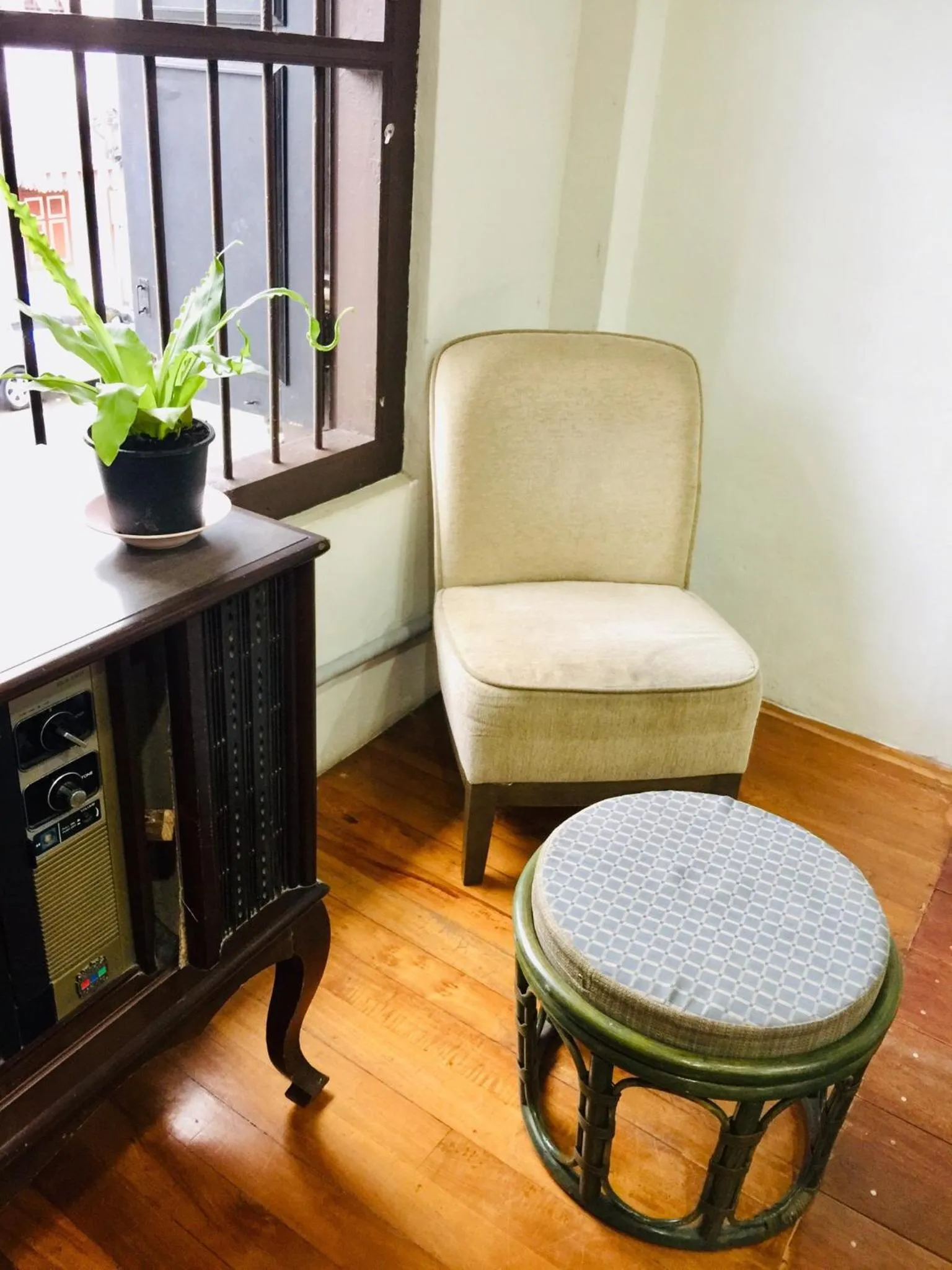 Communal lounge/ TV room in Phuket Sunny Hostel