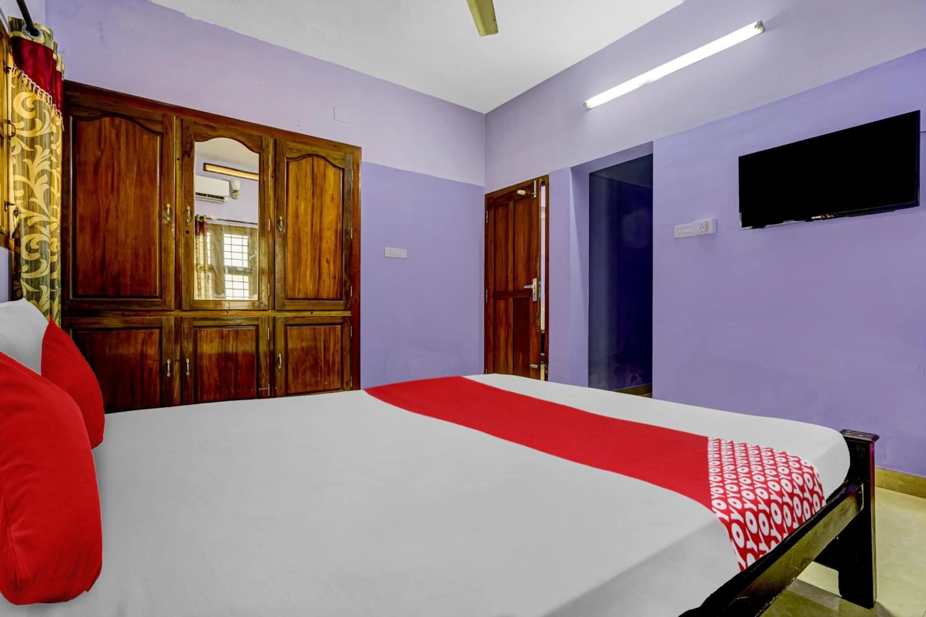 Bedroom in Hotel O Paradise villa