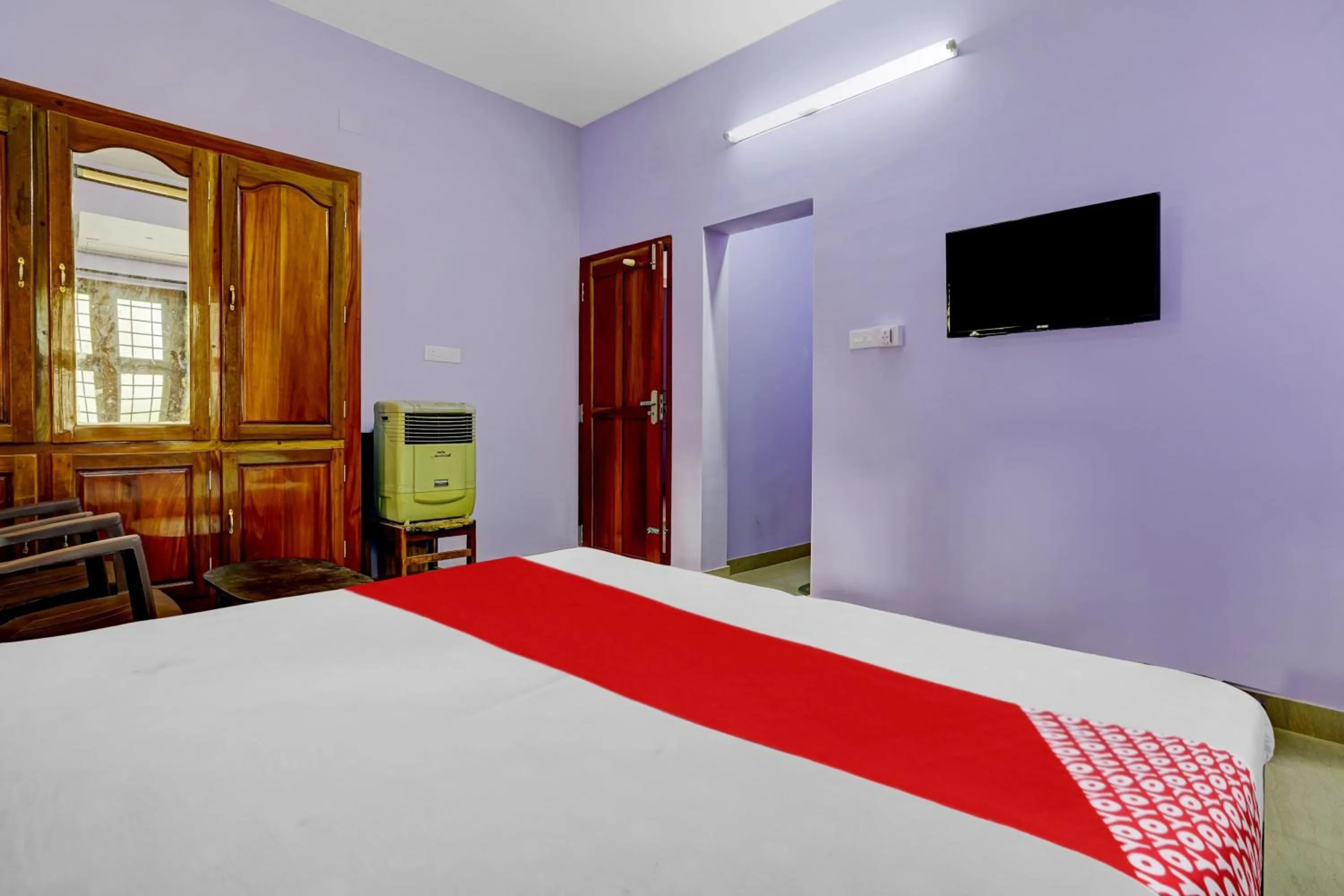 Bedroom in Hotel O Paradise villa