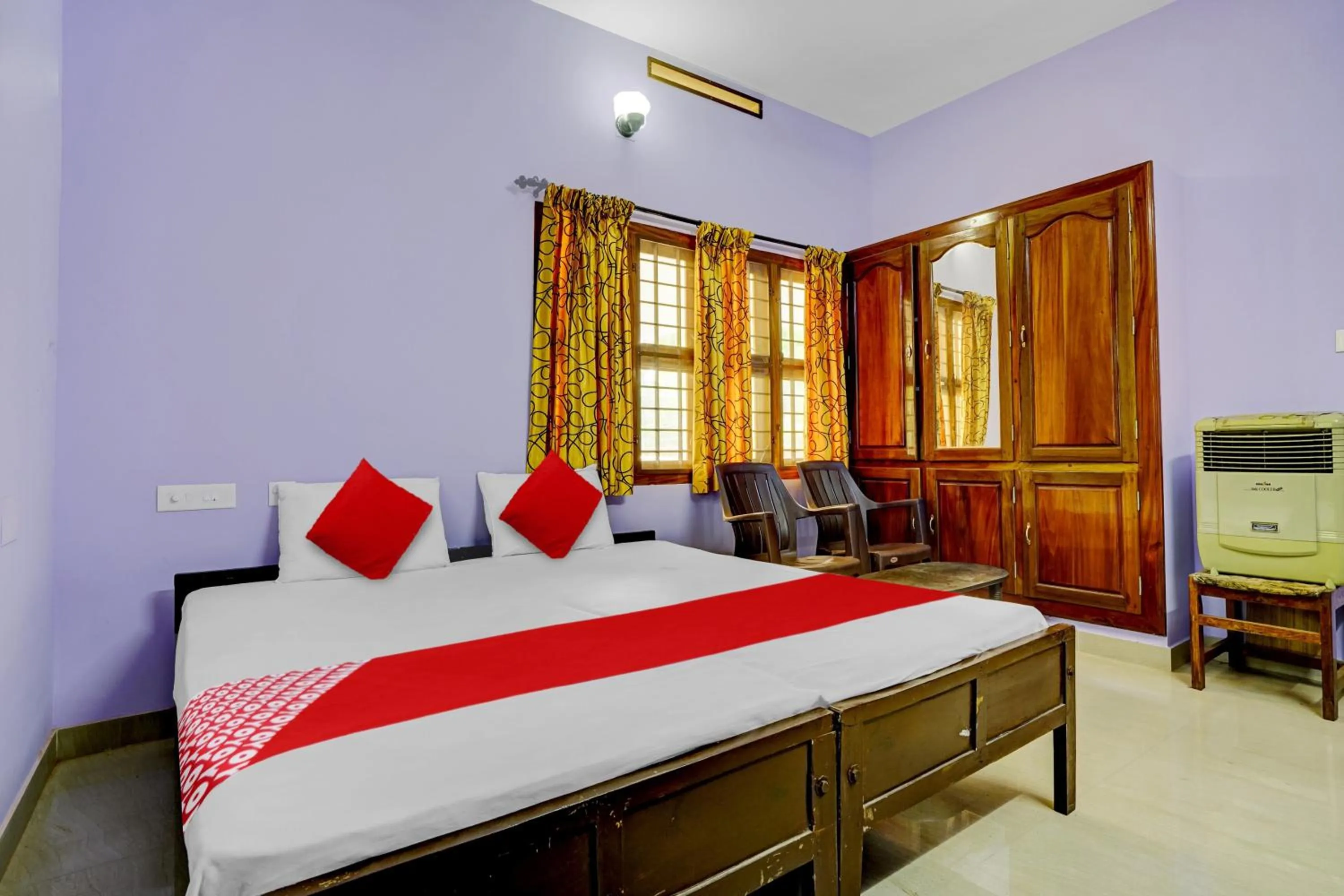 Bedroom in Hotel O Paradise villa