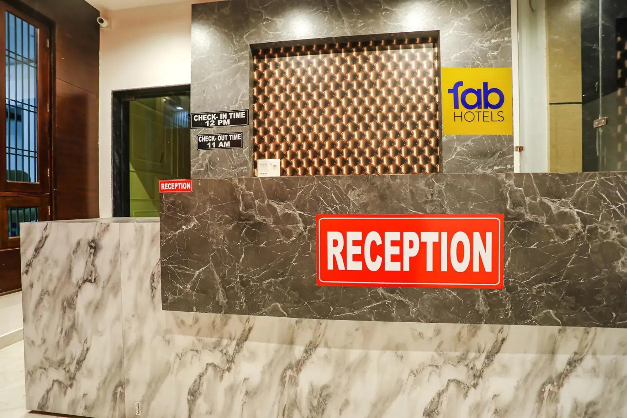 Lobby or reception in Fabhotel JP Villa - Nr Stadium Lobby or reception in Fabhotel JP Villa - Nr Stadium