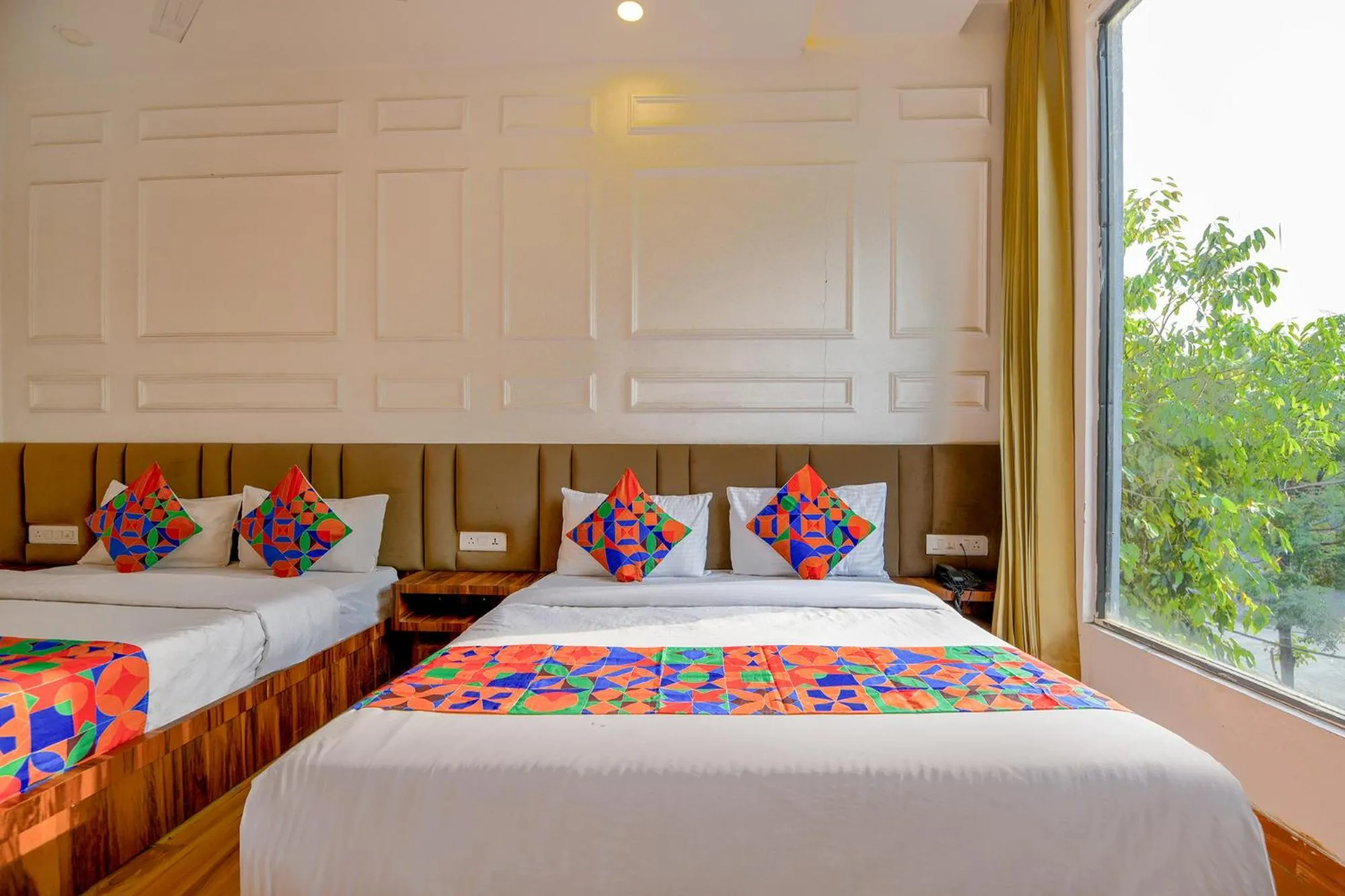 Bed in FabHotel Amar Villa