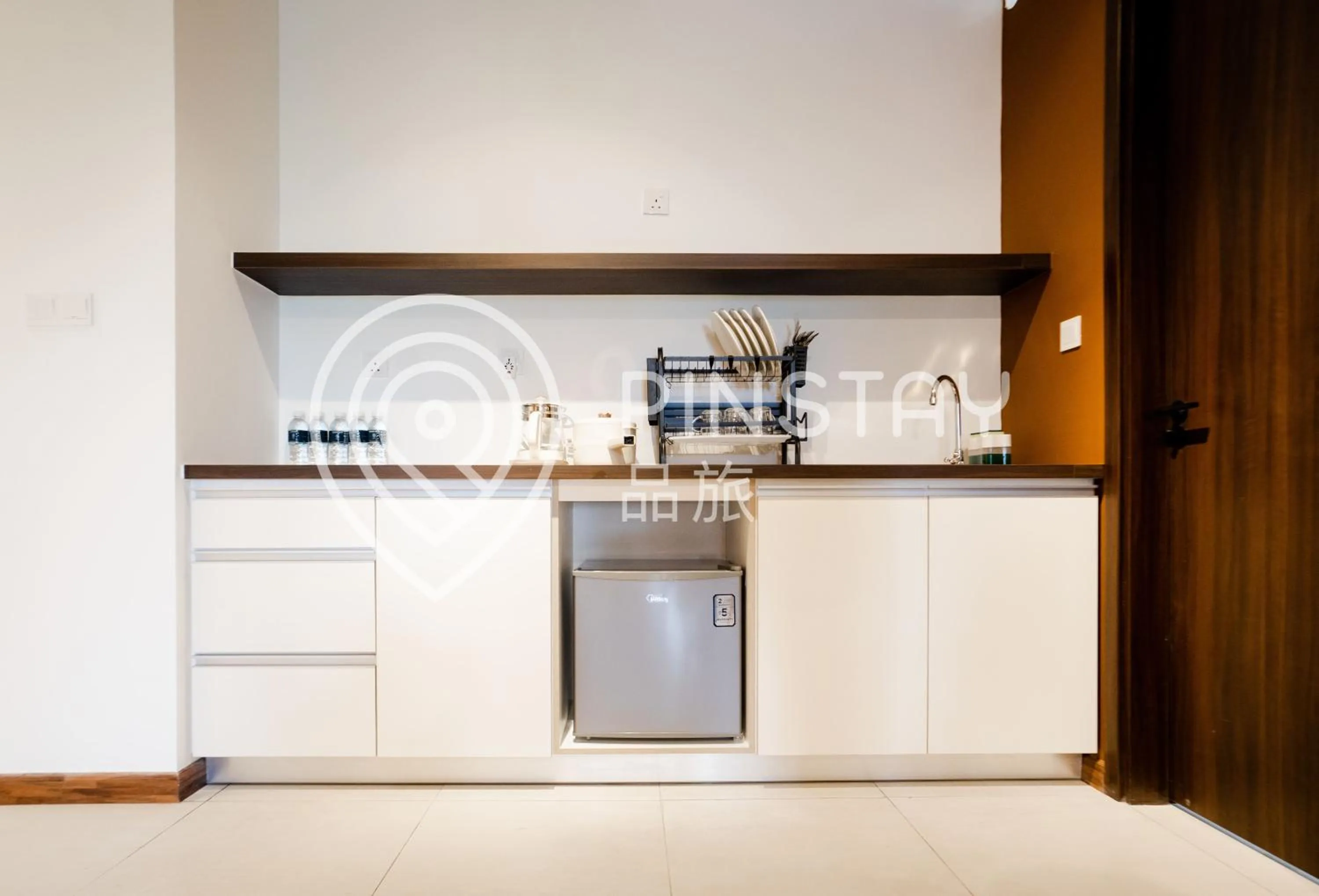 Kitchen or kitchenette in K Avenue by Pinstay