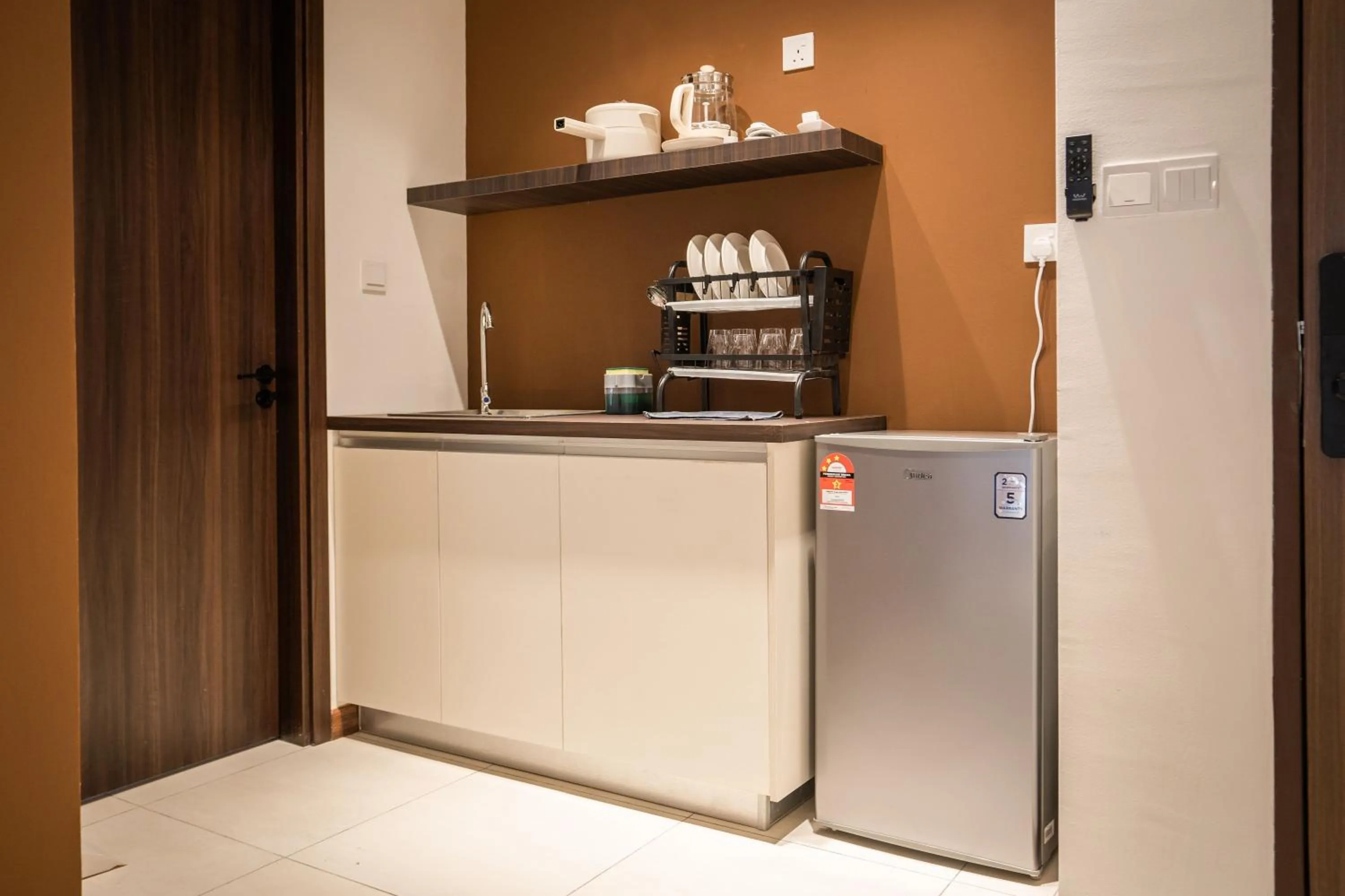 Kitchen or kitchenette in K Avenue by Pinstay