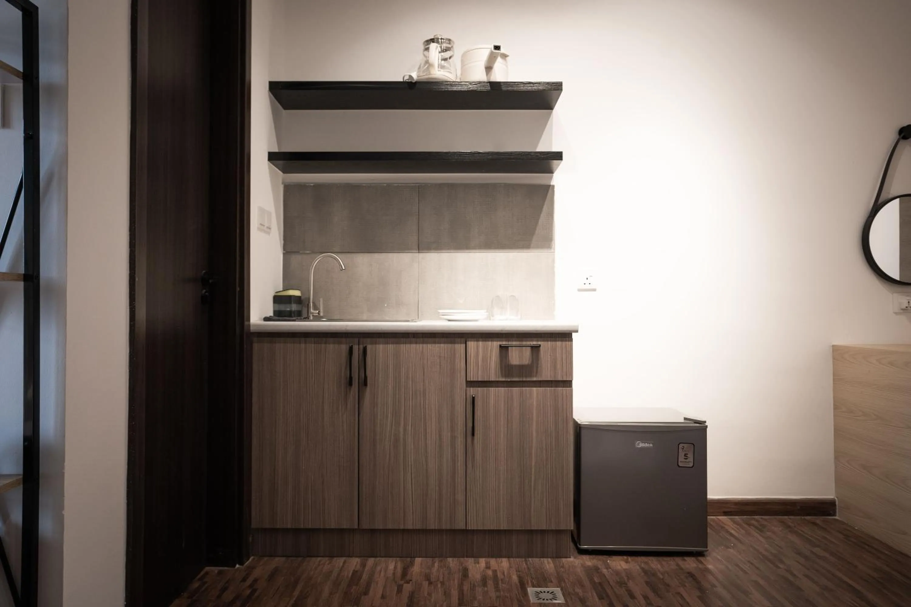 Kitchen or kitchenette in K Avenue by Pinstay