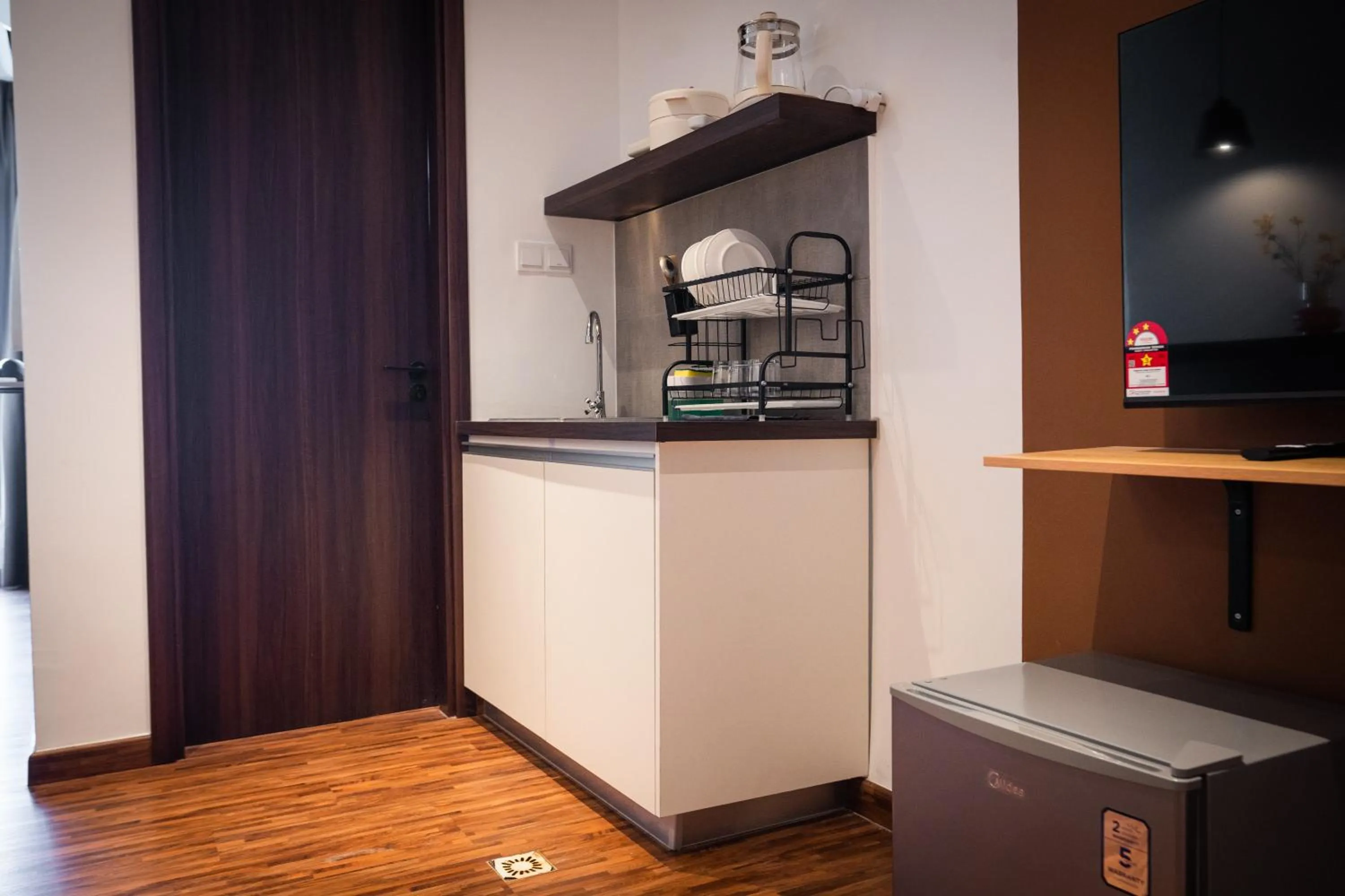 Kitchen or kitchenette in K Avenue by Pinstay