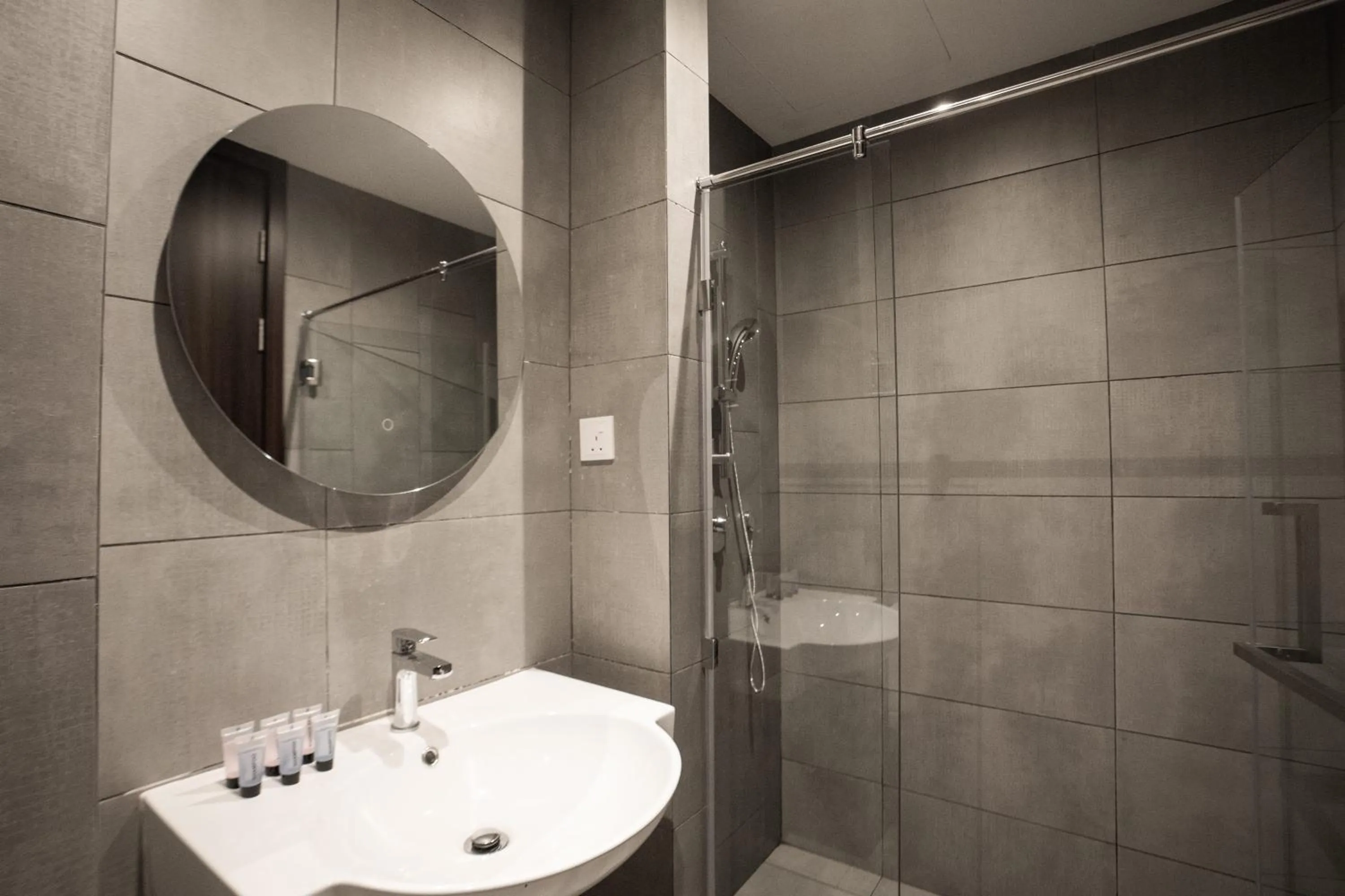 Bathroom in K Avenue by Pinstay