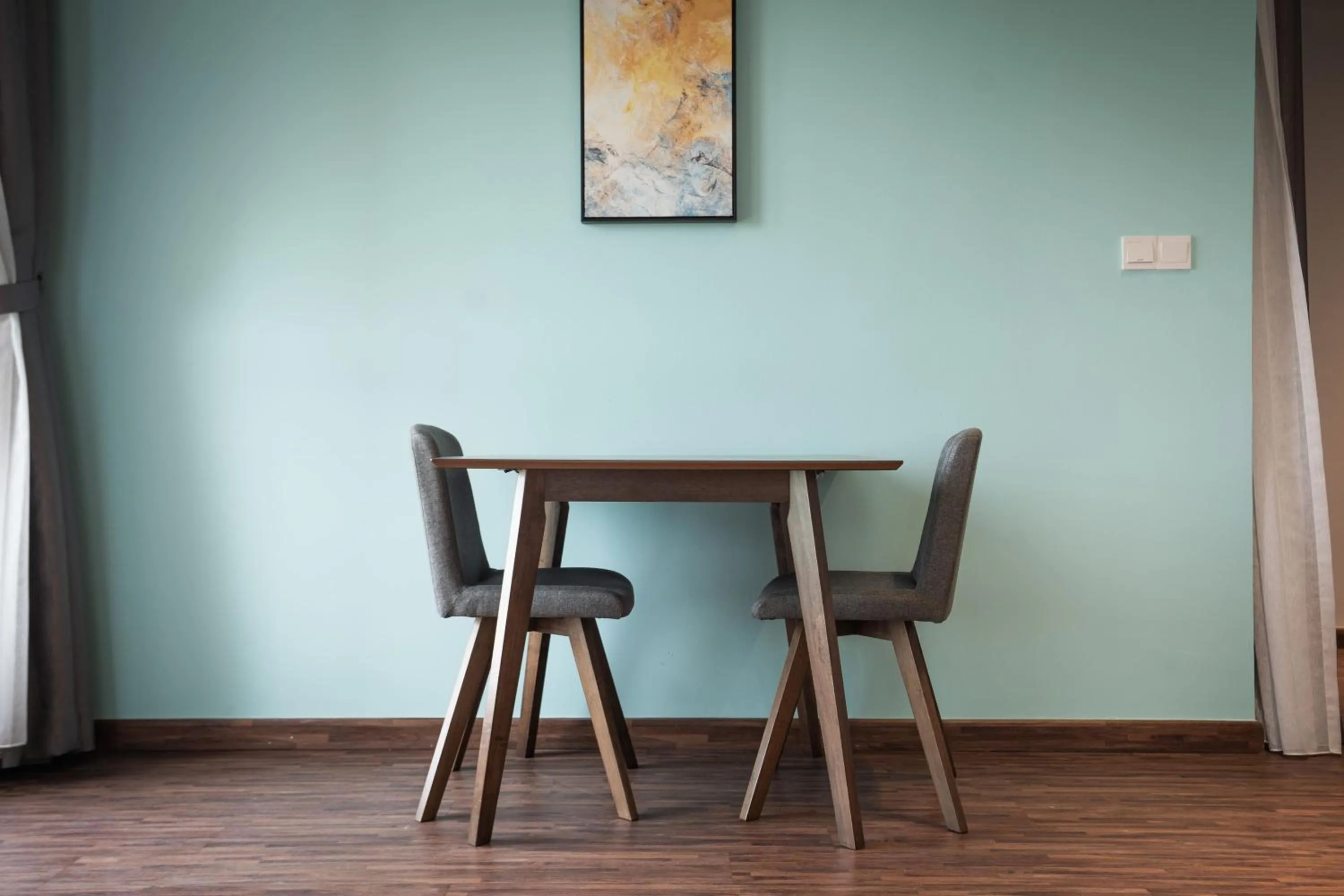 Dining area in K Avenue by Pinstay