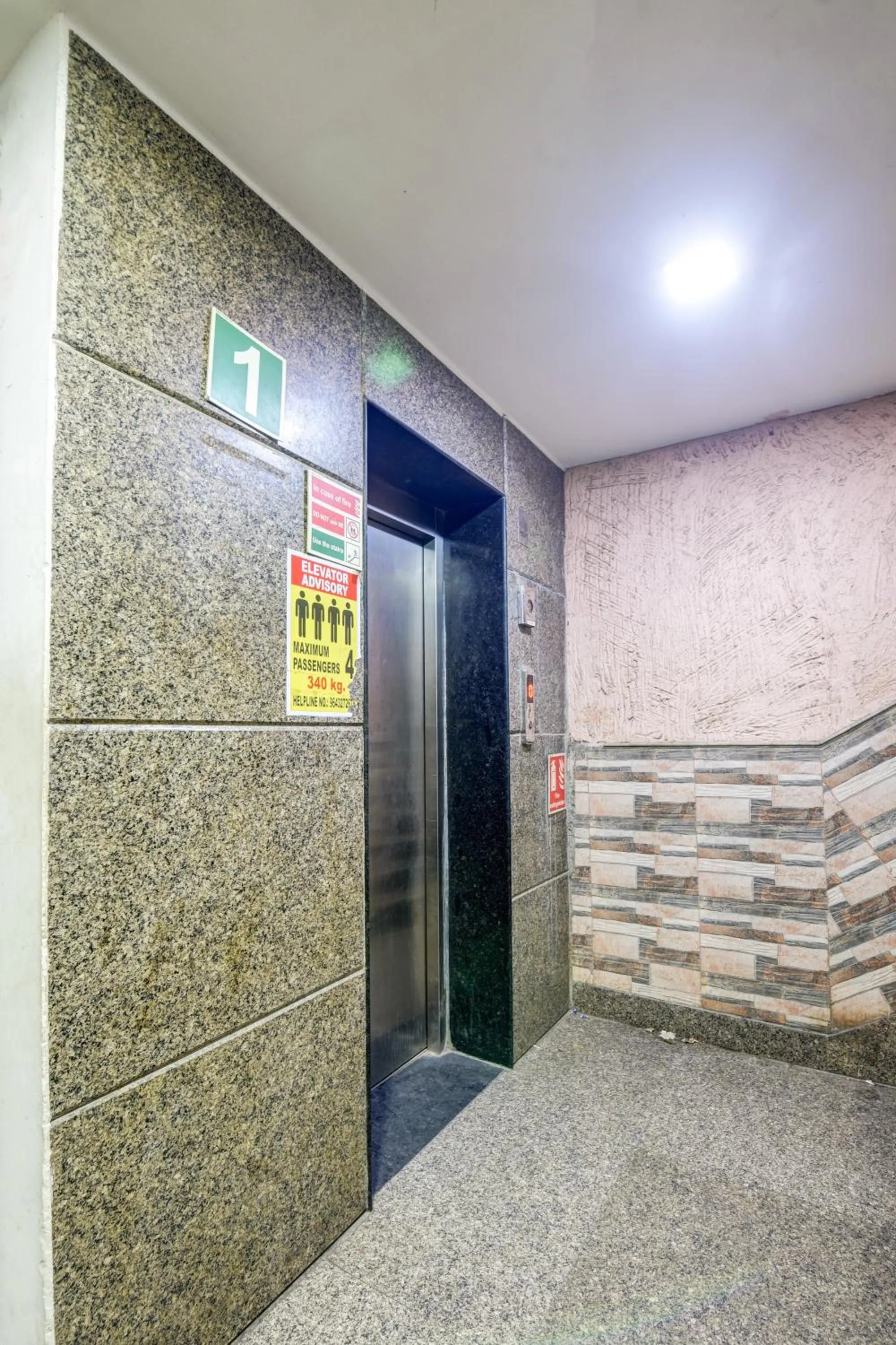 elevator in Hotel Heritage Home -3 Mins Walk from Metro And 5 Mins from Rail Station