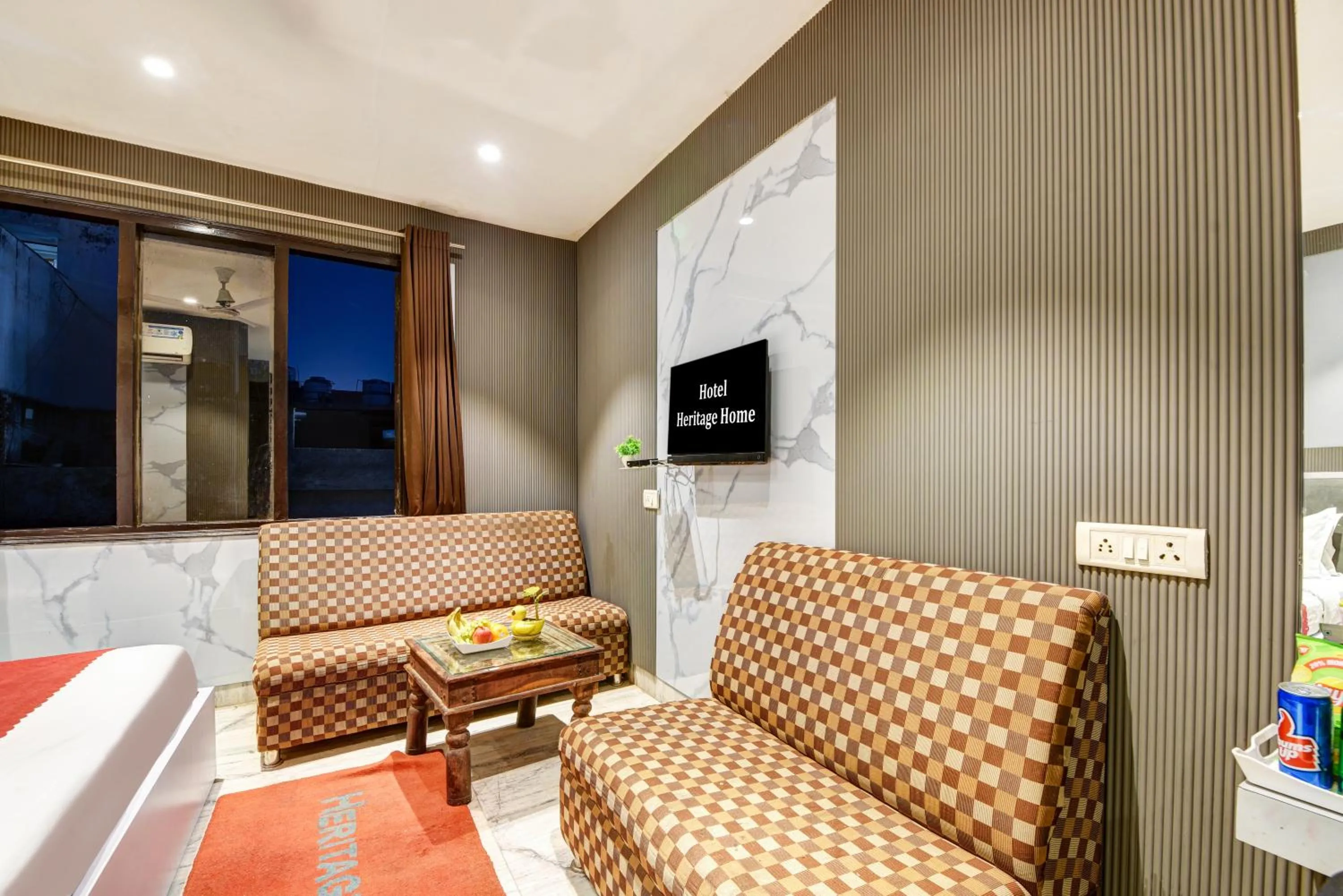 Seating area in Hotel Heritage Home -3 Mins Walk from Metro And 5 Mins from Rail Station