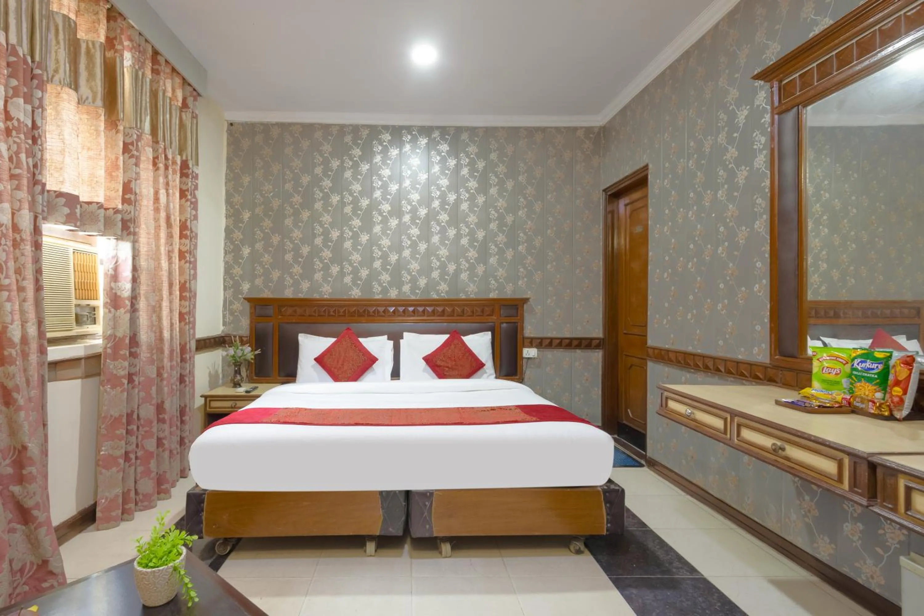 Bed in Hotel Amar Inn by Quadis - Lajpat Nagar