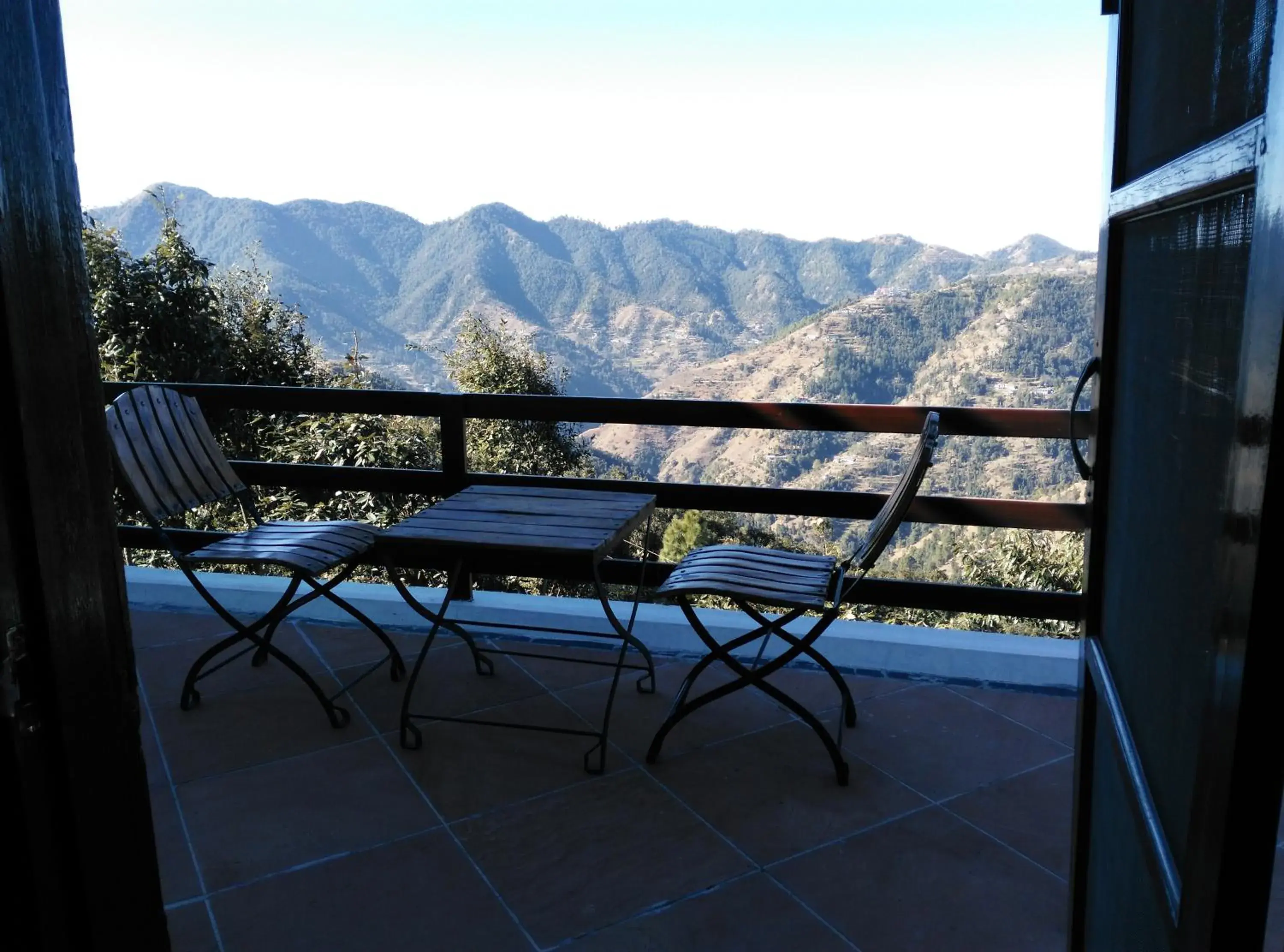 Attic Room with Balcony in Woodsmoke Retreat Attic Room with Balcony in Woodsmoke Retreat