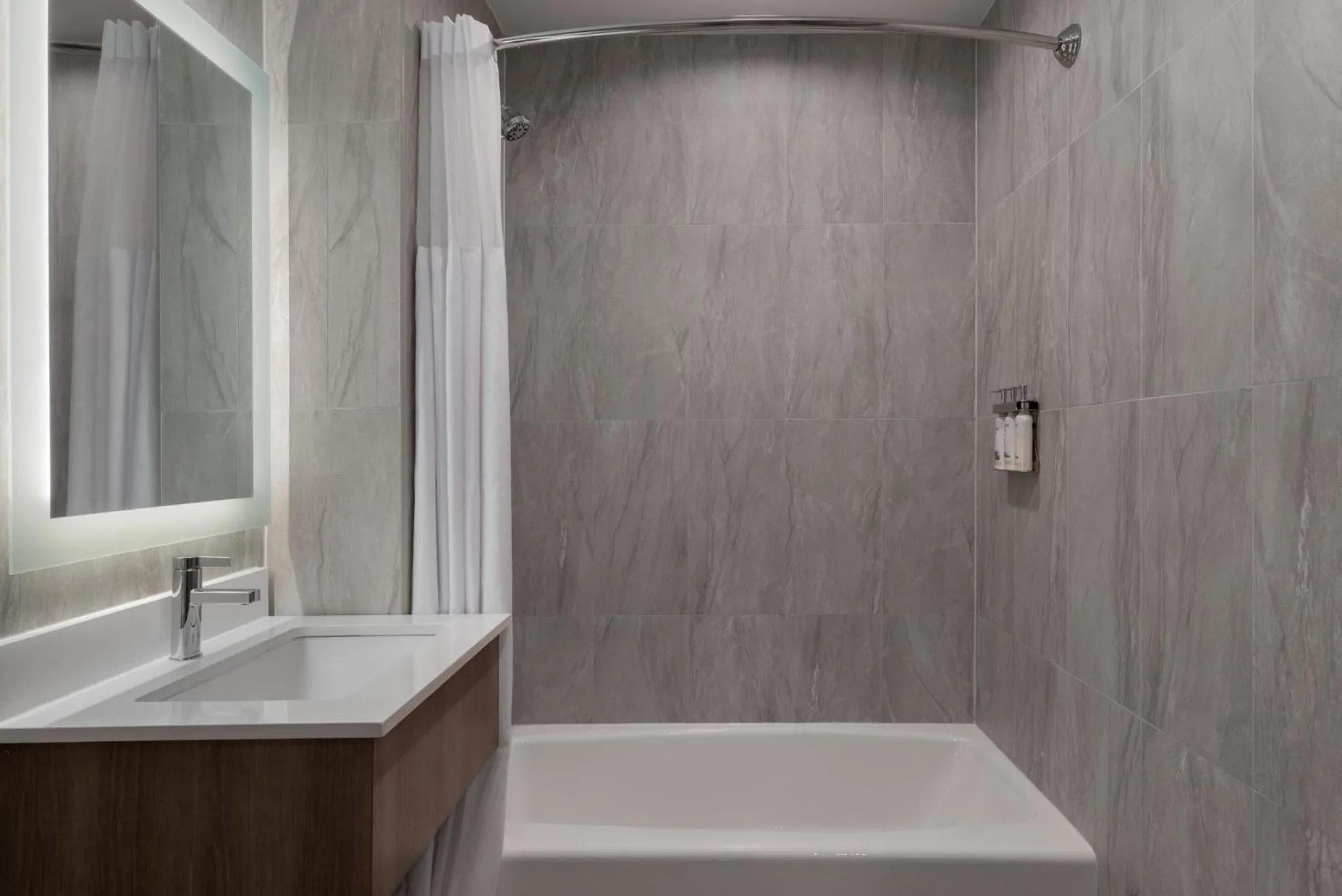 Bathroom in Holiday Inn Express & Suites Bronx - Zoo Area by IHG