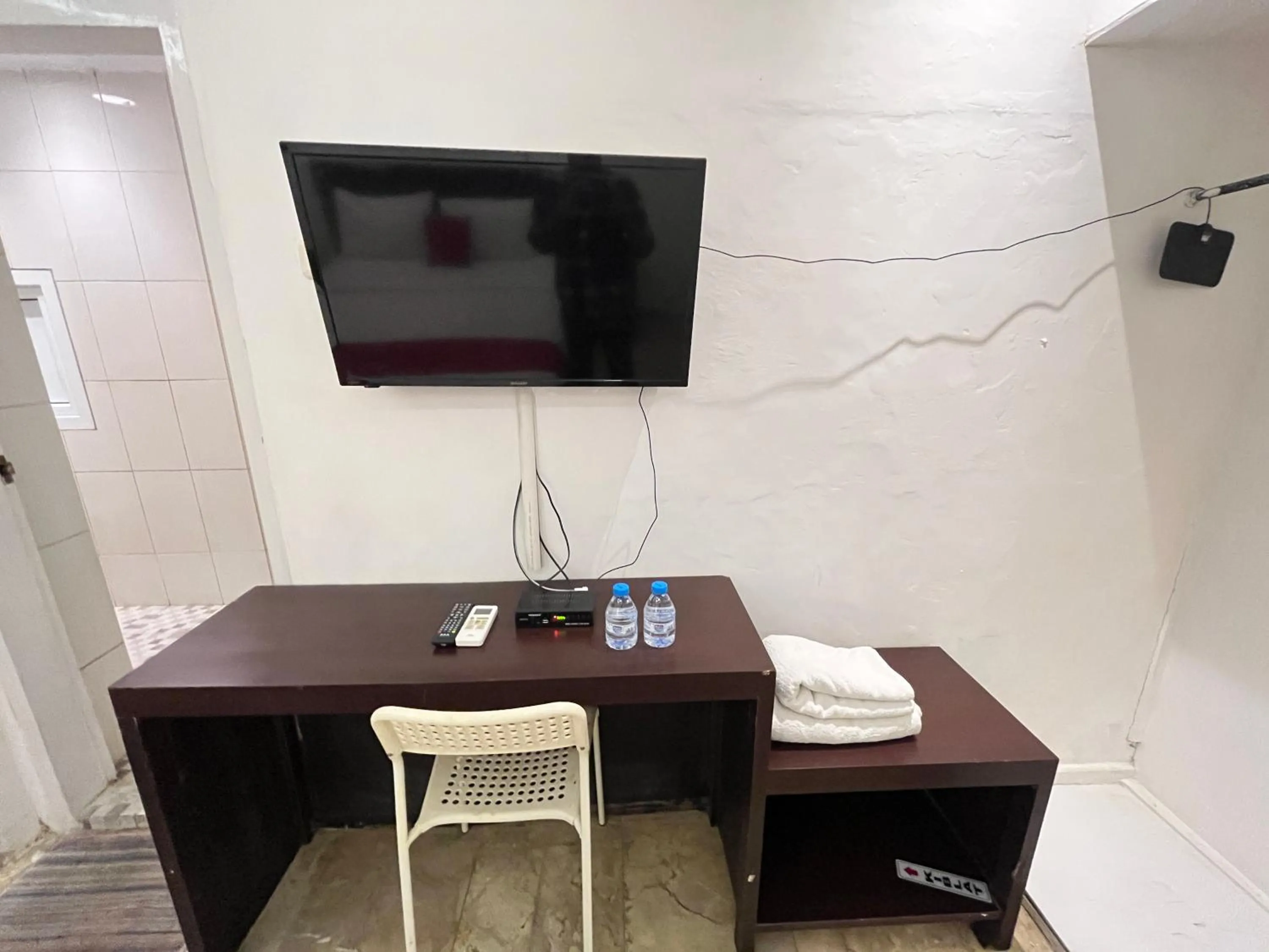 TV and multimedia in RedDoorz near Kantor Walikota Manado