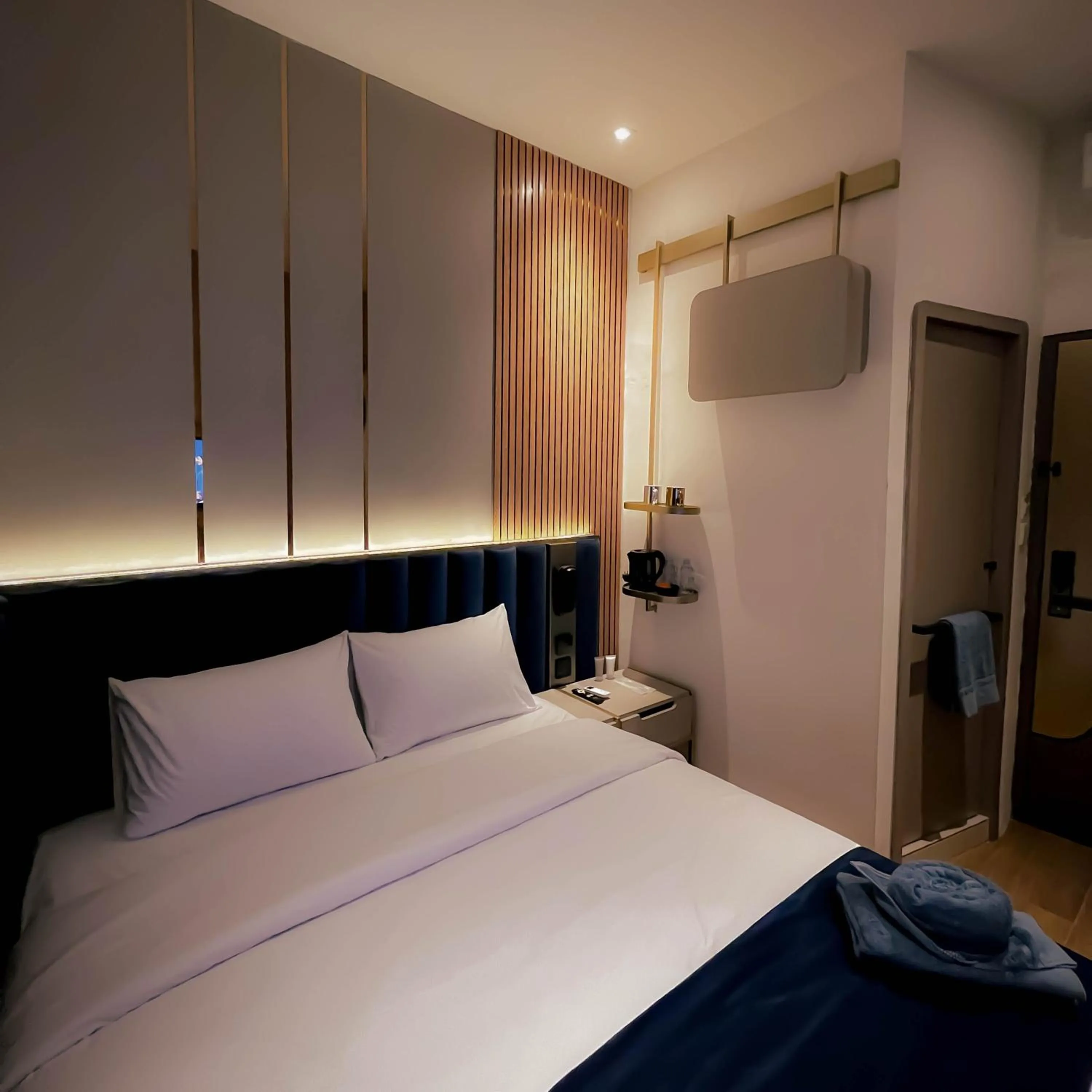 Bed in Qube Hotel by 98hospitality