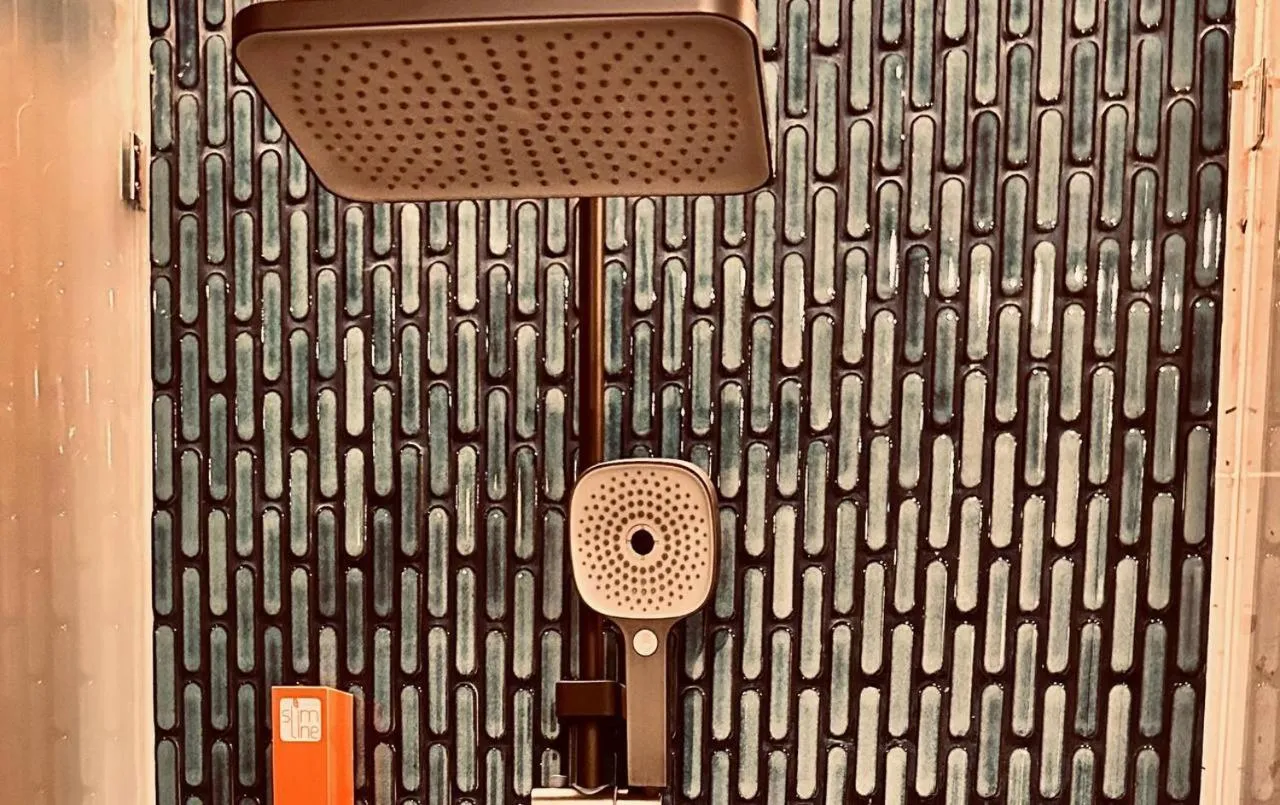 Shower in Qube Hotel by 98hospitality