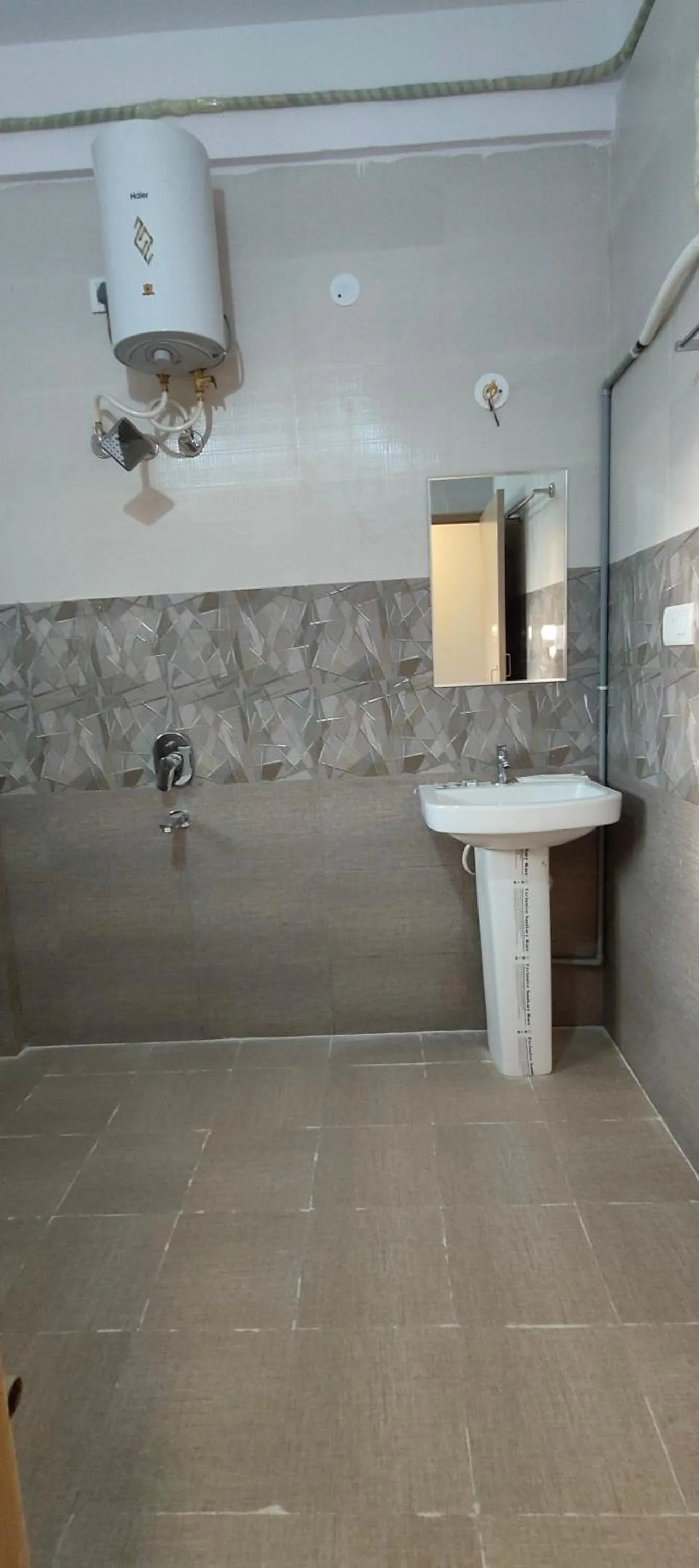 Bathroom in Hotel Amulya Regency