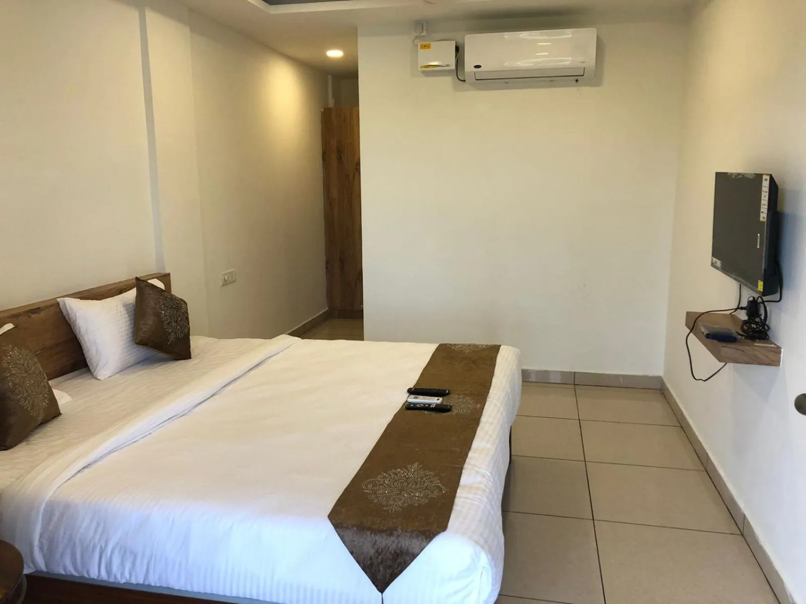 Photo of the whole room, Bed in Hotel Amulya Regency