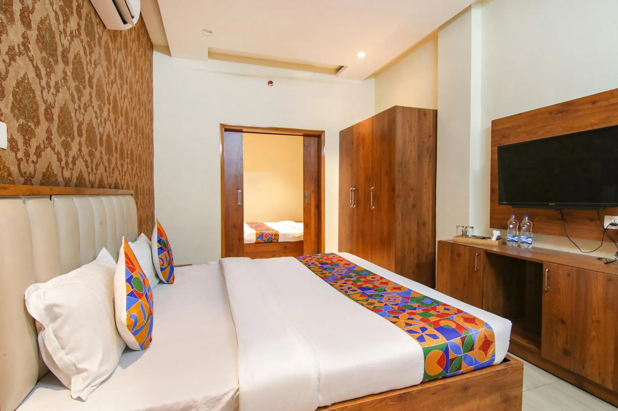 Bed in FabHotel K9 Regency
