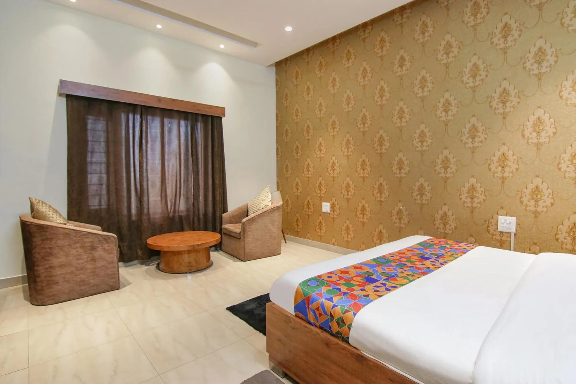 Bed in FabHotel K9 Regency