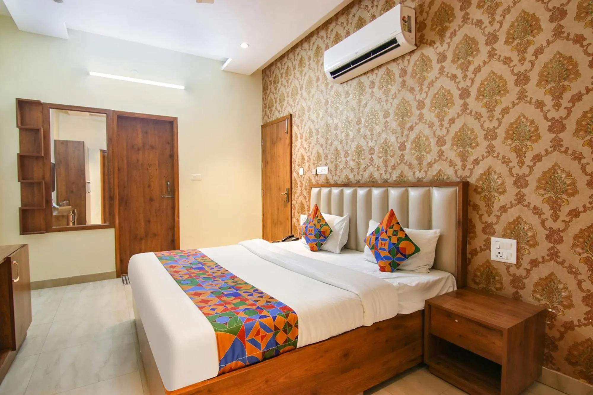Bed in FabHotel K9 Regency