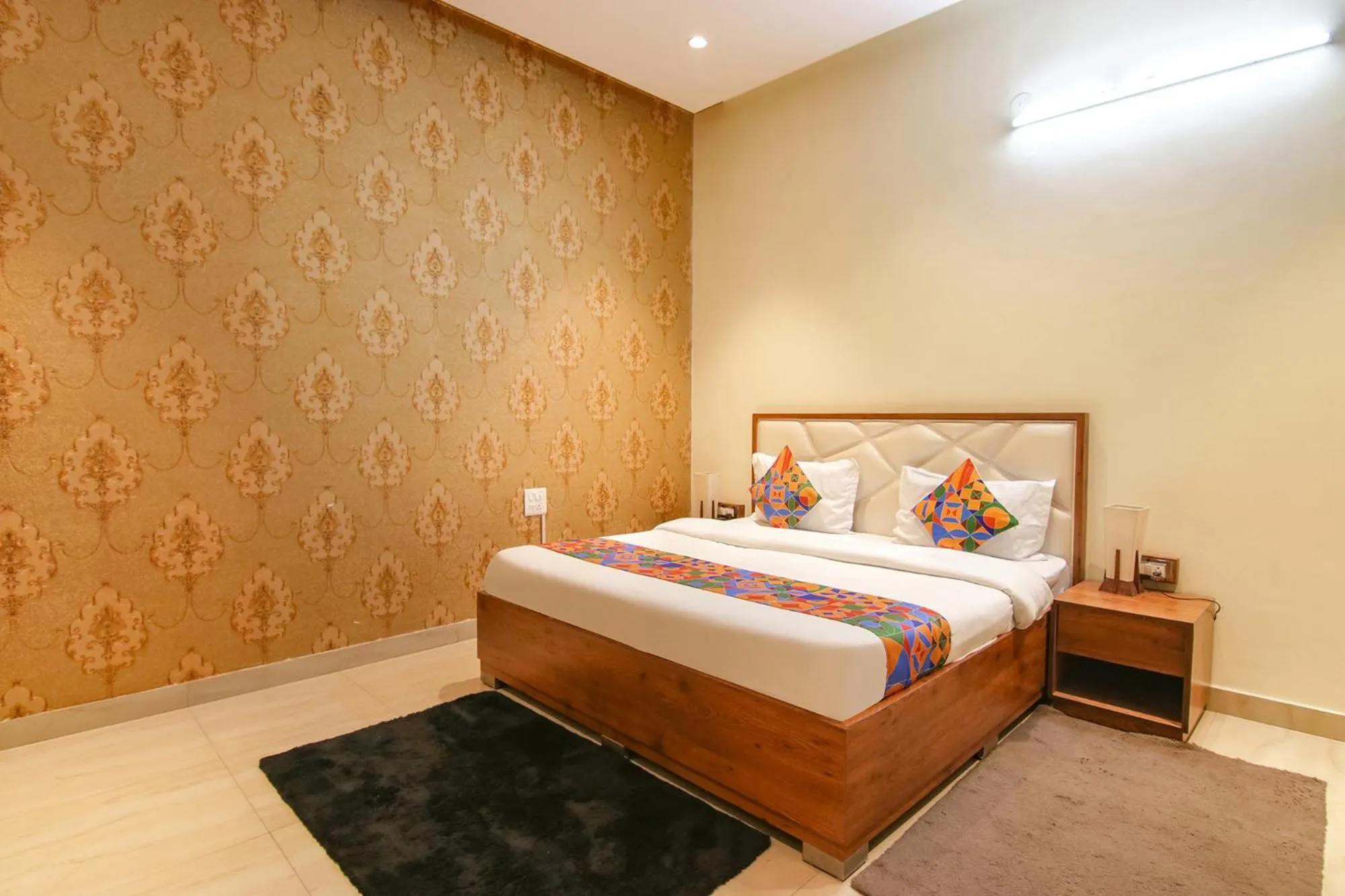 Bed in FabHotel K9 Regency