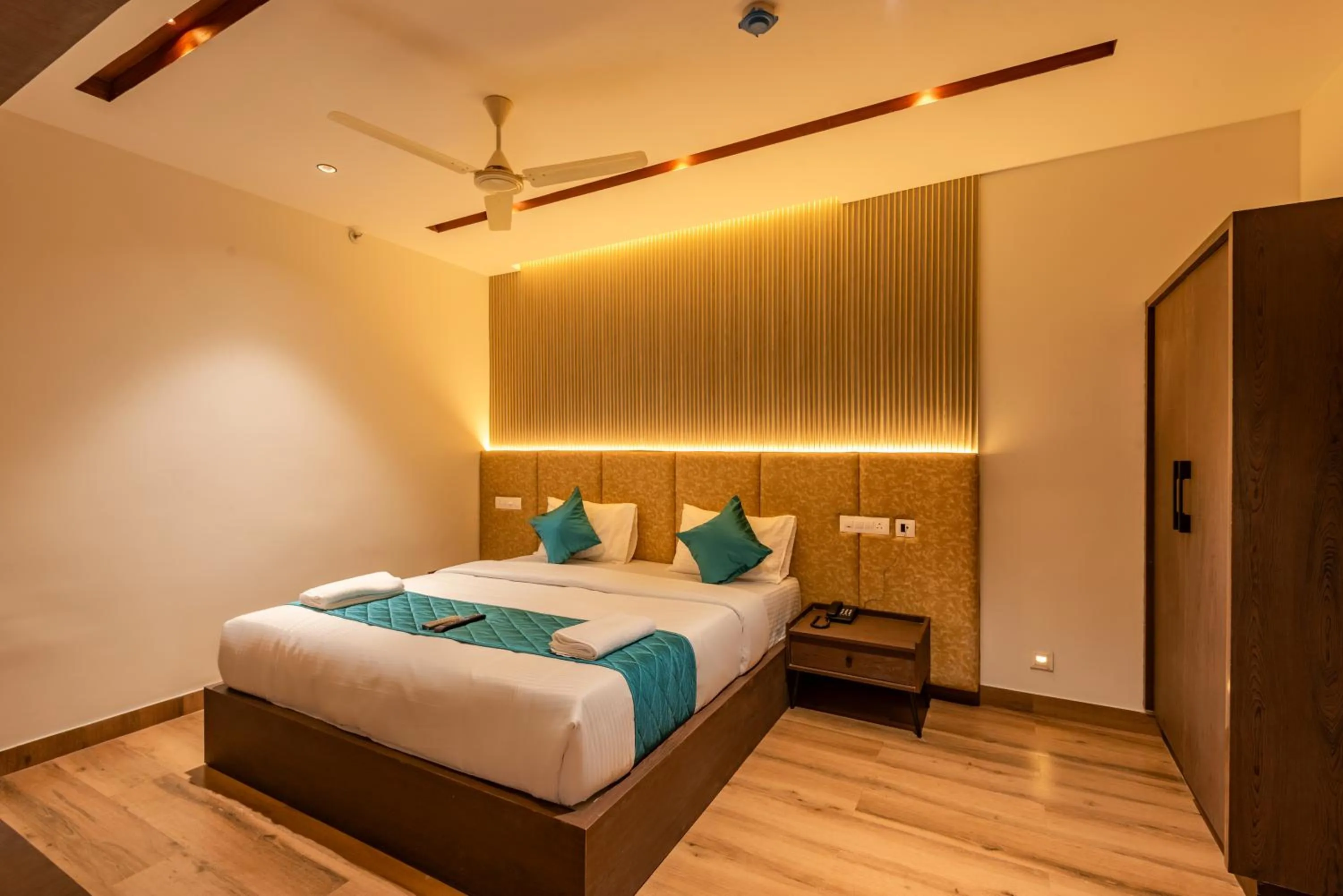 Bed in Hotel Stay Bella Kozhikode