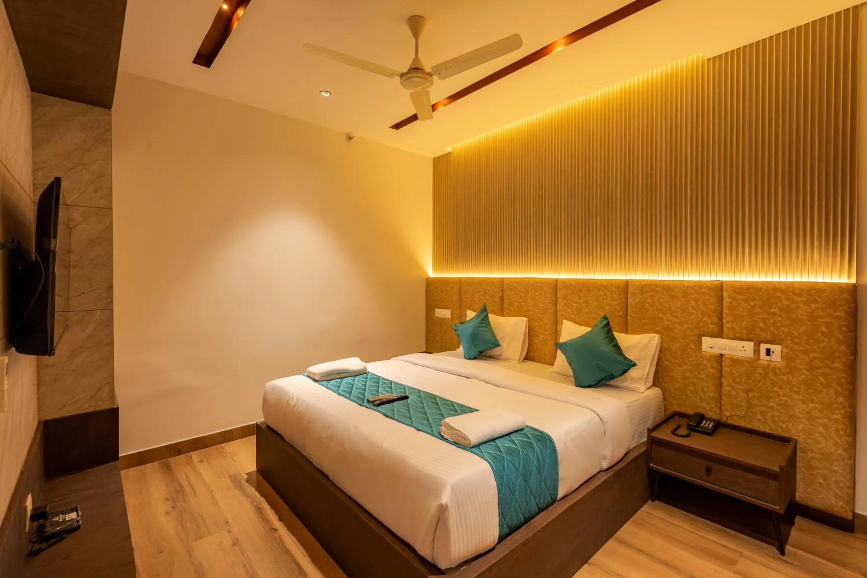 Bed in Hotel Stay Bella Kozhikode