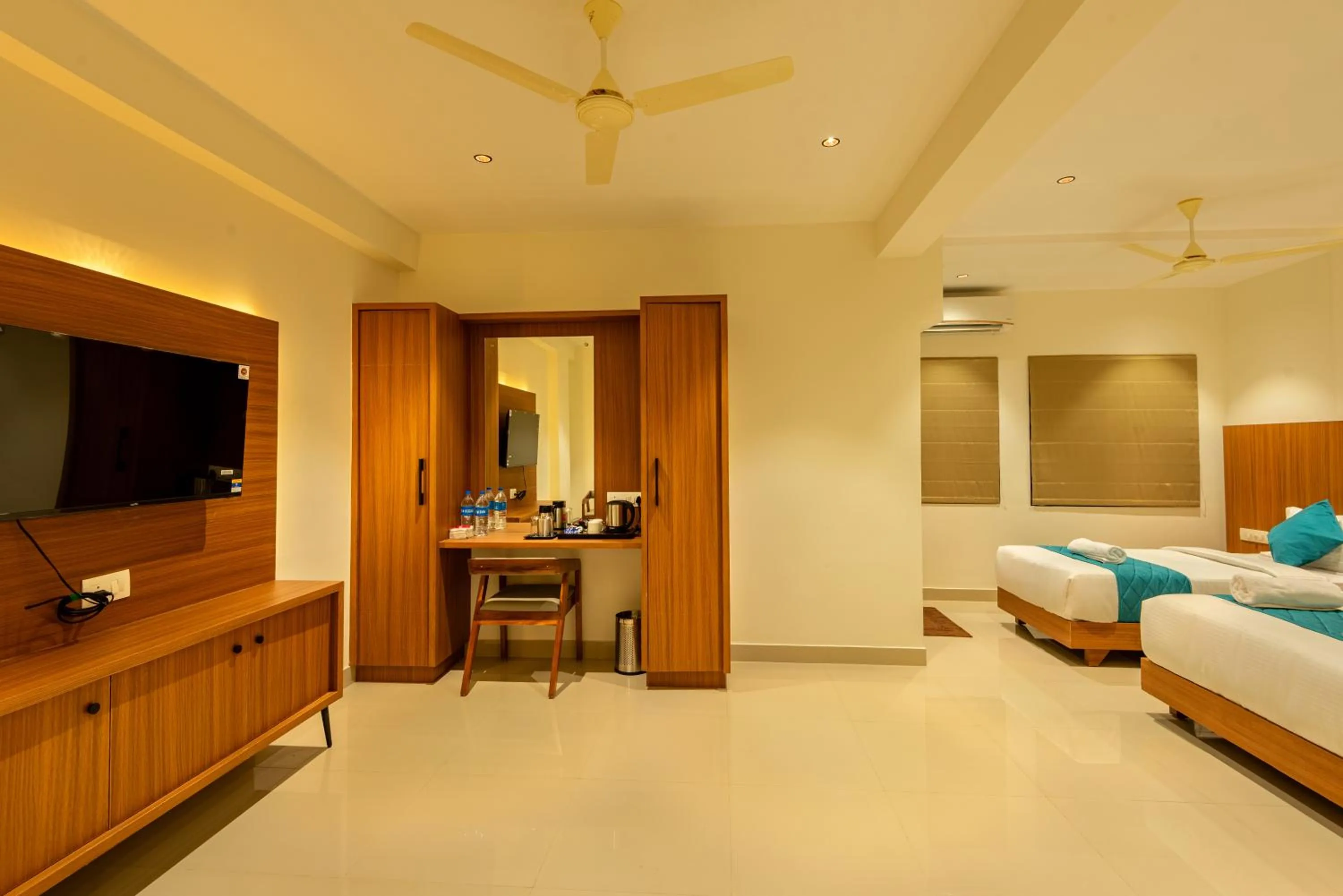 Bed in Hotel Stay Bella Kozhikode